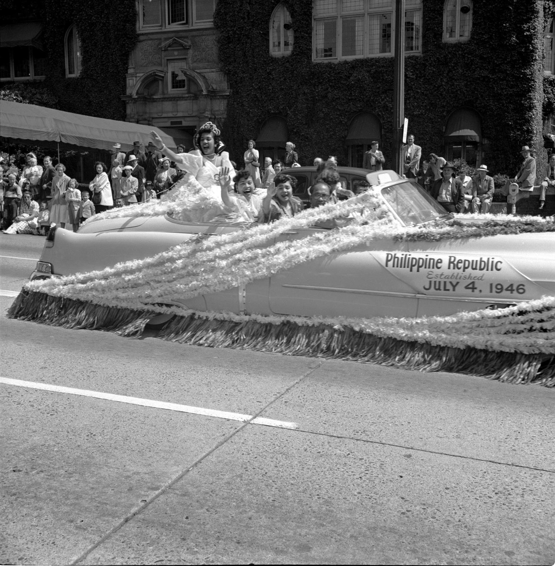 Image of Philippine Republic representatives riding in July 4th parade, Seattle, circa 1953
