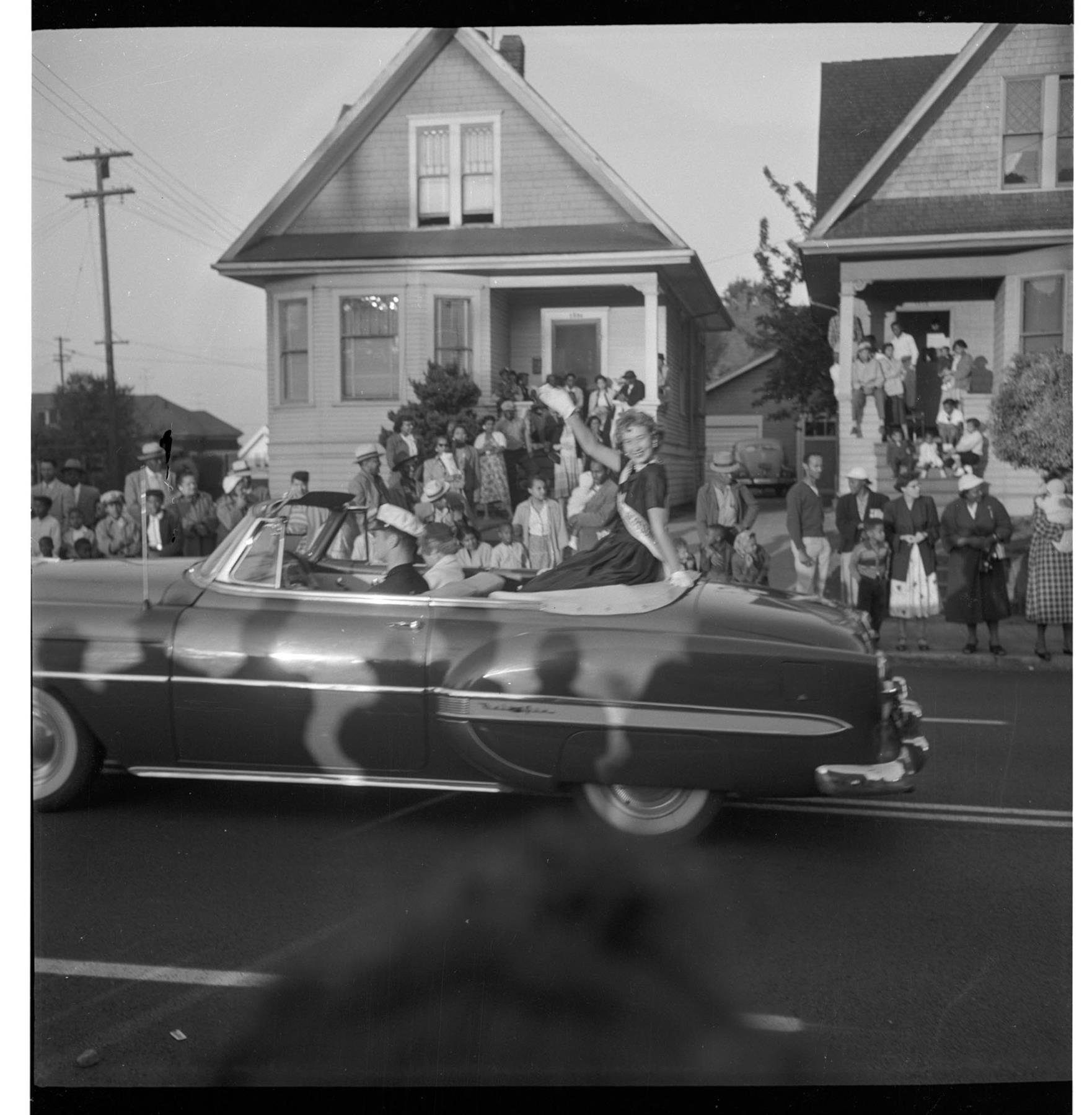 Image of Festival queen riding in parade, Seattle, circa 1953