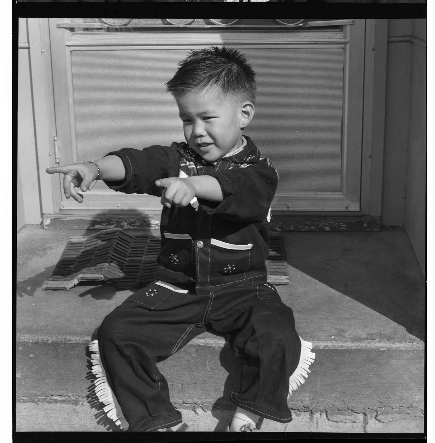 Image of Portrait of Kaylon Mar wearing a cowboy outfit, Seattle, circa 1953