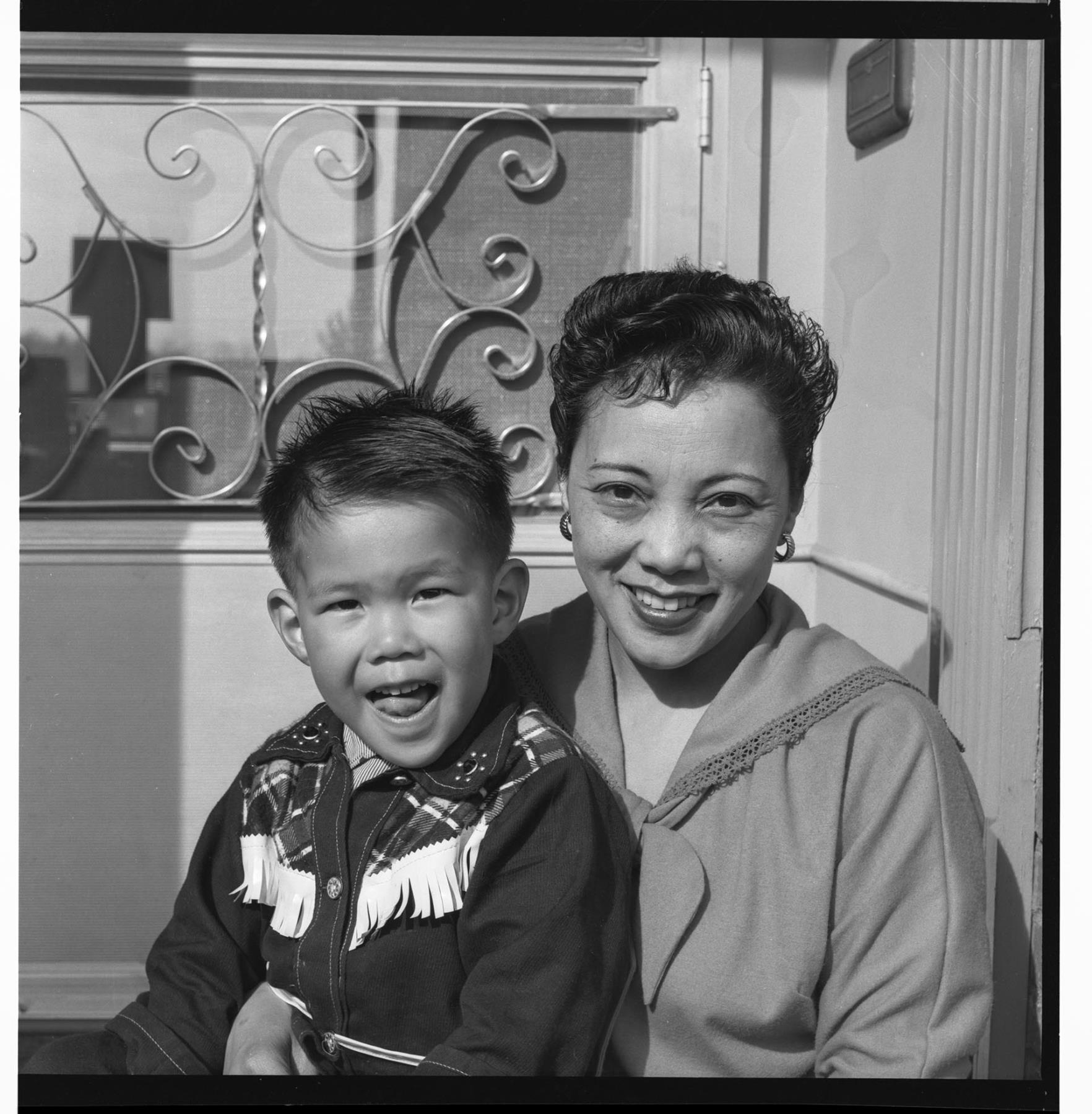 Image of Millie and Kaylon Mar sitting on doorstep, Seattle, circa 1953
