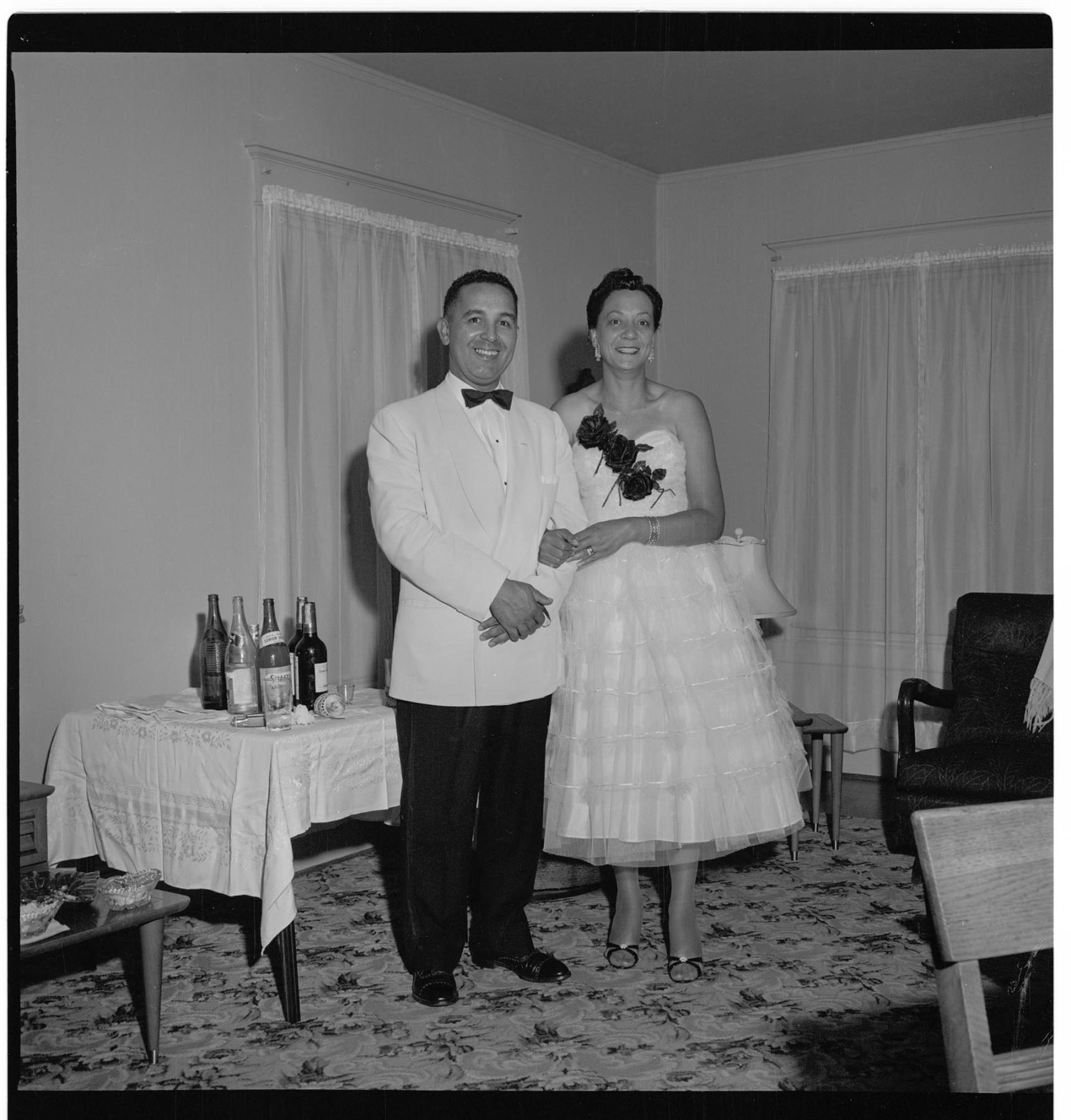 Image of Charles and Claudine Winston posing in semi-formal attire, Seattle, circa 1953