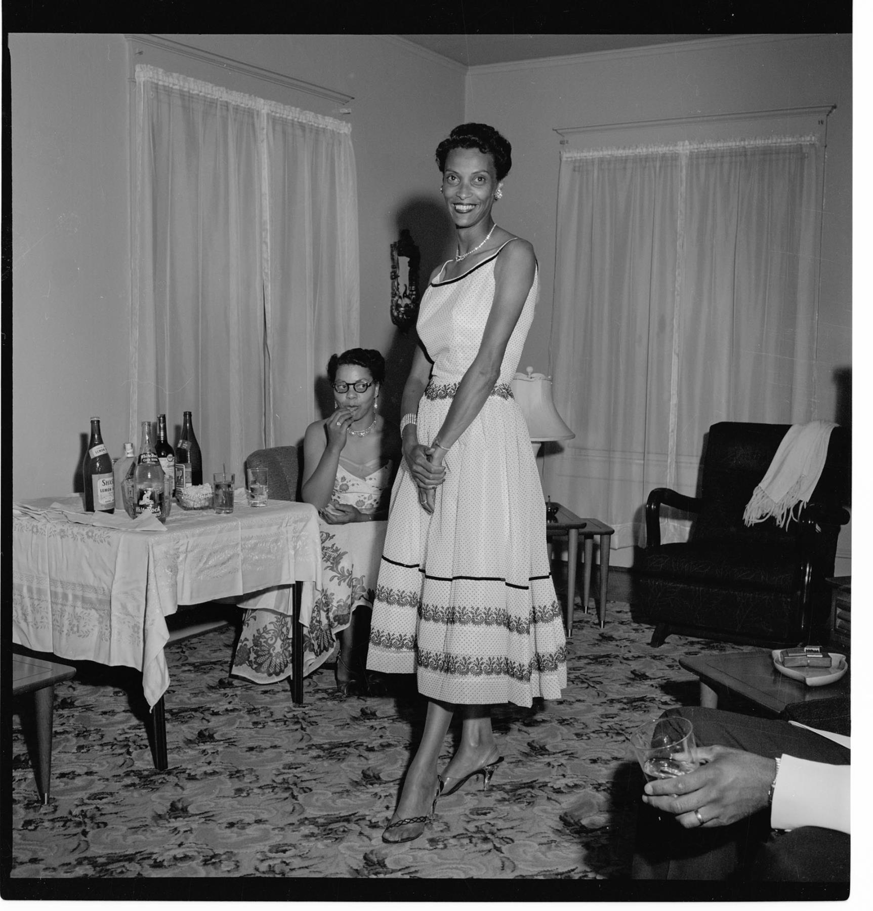 Image of Izzie Smith posing in semi-formal attire, Seattle, circa 1953