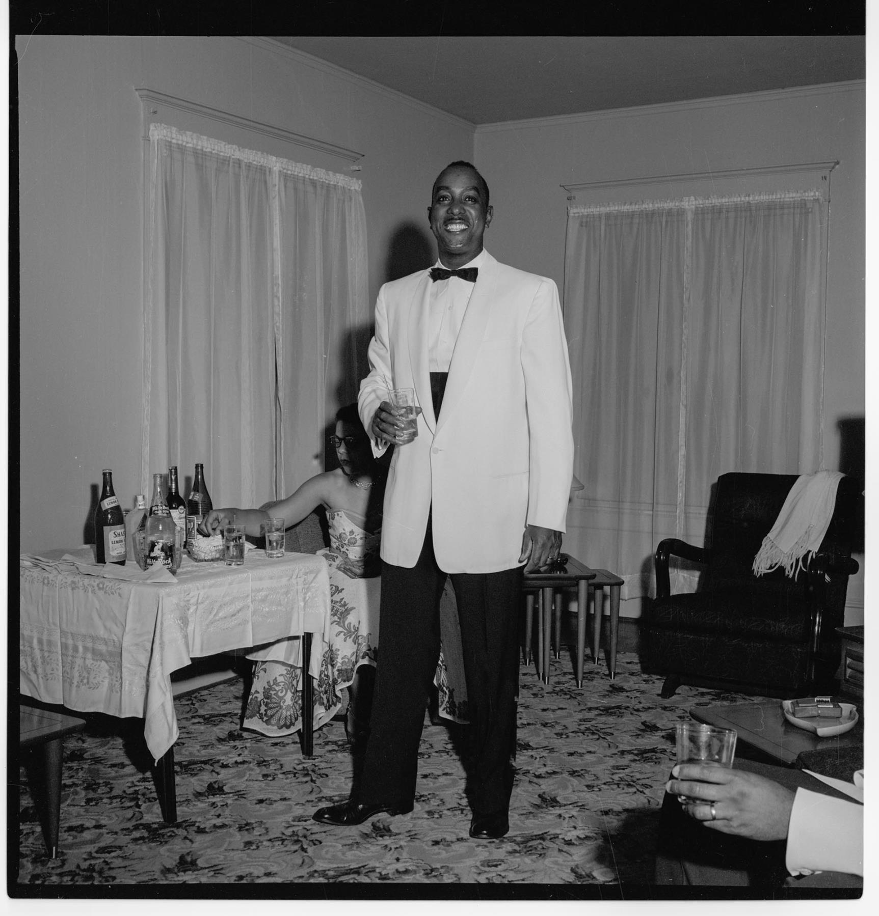 Image of Durwood Moore posing in formal attire, Seattle, circa 1953
