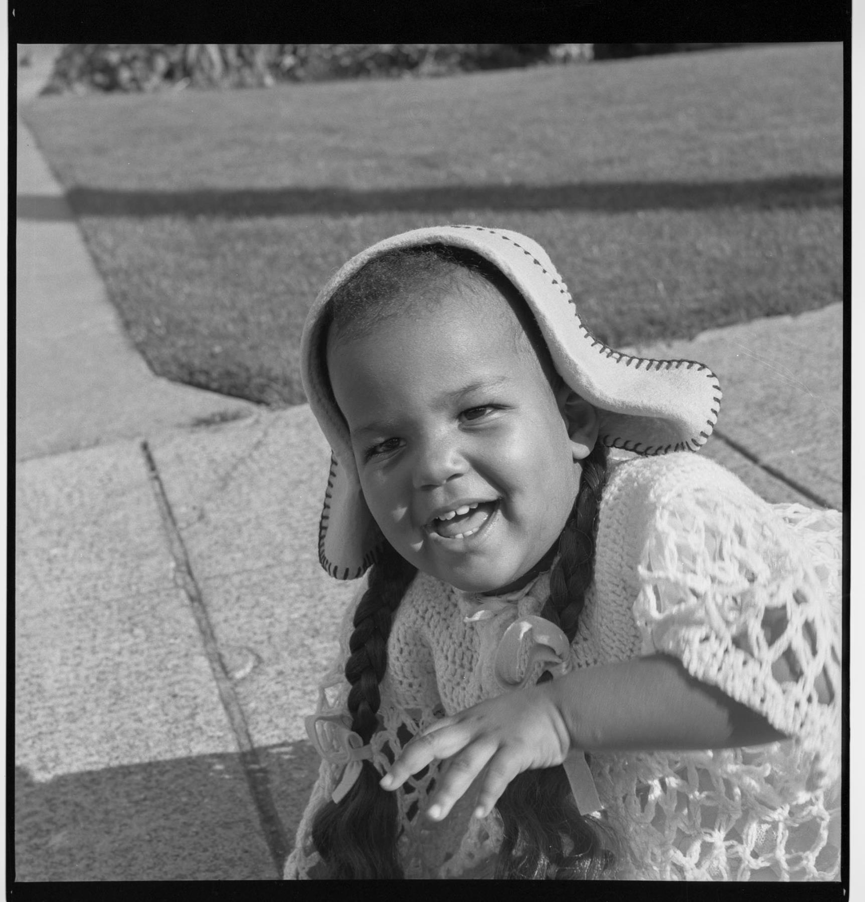 Image of Carol Peoples playing outside, Seattle, circa 1952