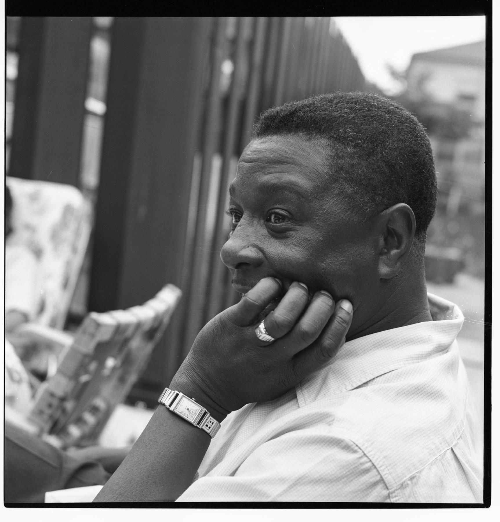 Image of Howard Allen sitting in backyard, Seattle, circa 1953