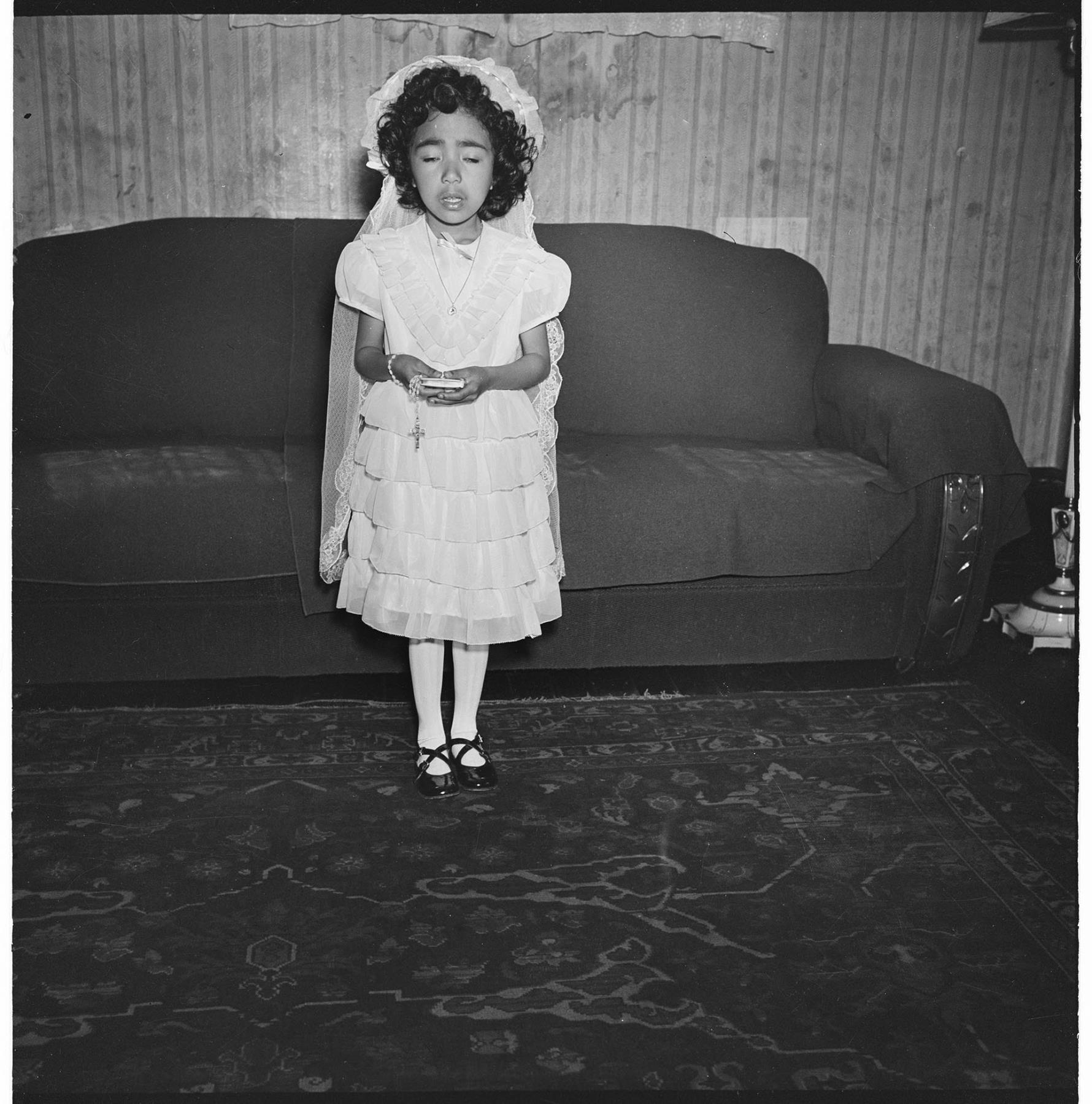 Image of Girl posing in First Communion dress, Seattle, circa 1953