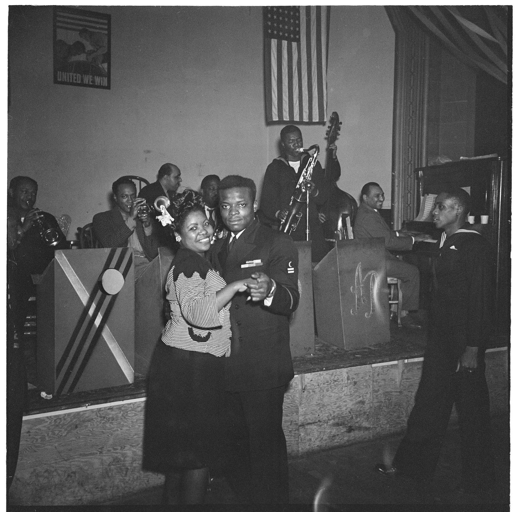 Image of Couple dancing in front of  band at Savoy Ballroom, Seattle, circa 1953