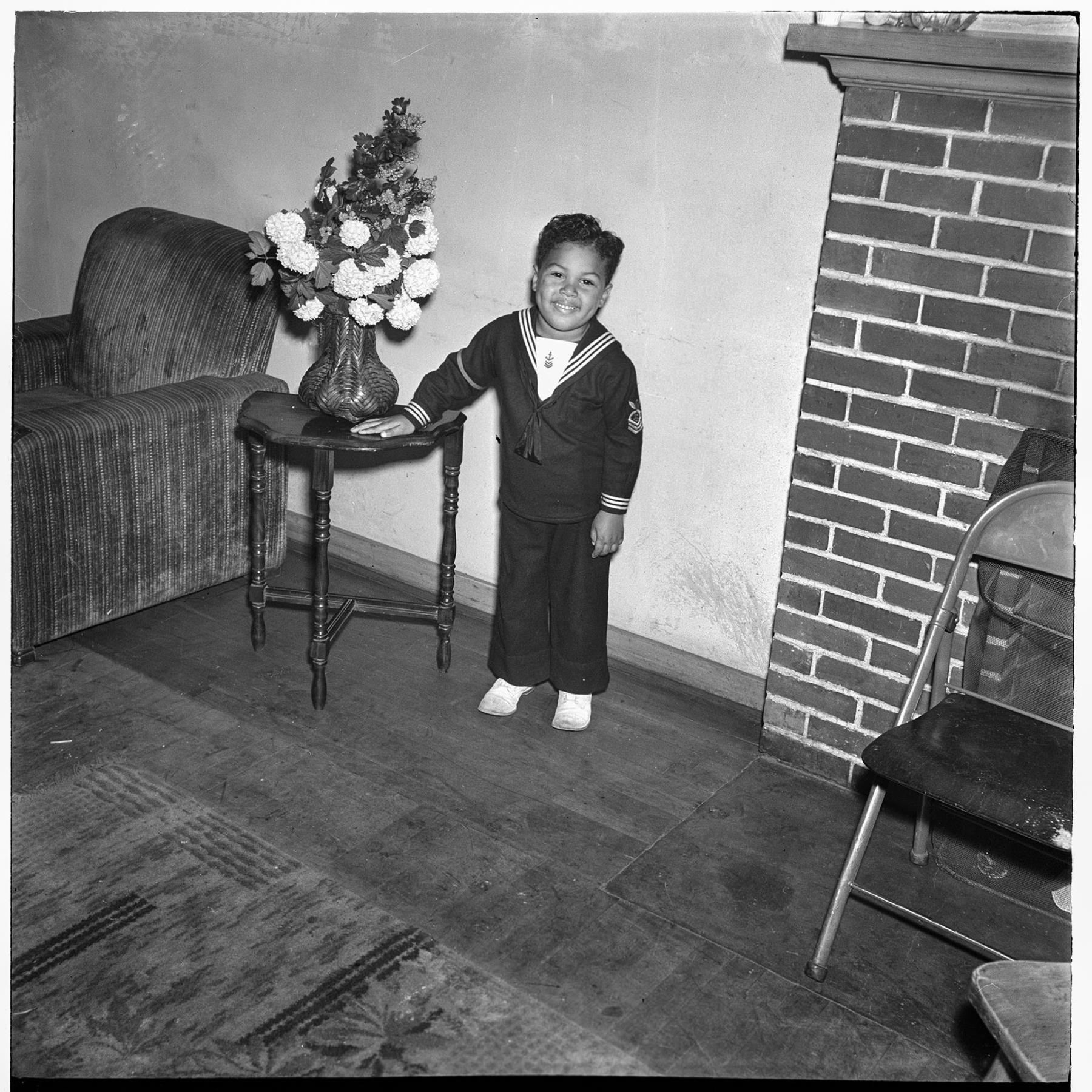 Image of Boy posing in a naval uniform, Seattle, circa 1953