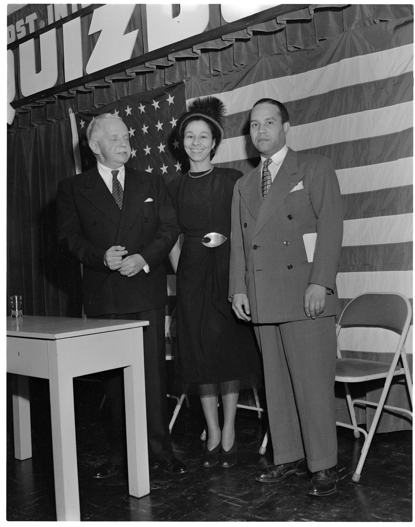 Image of Walter White posing with two others, Seattle, November 20, 1949