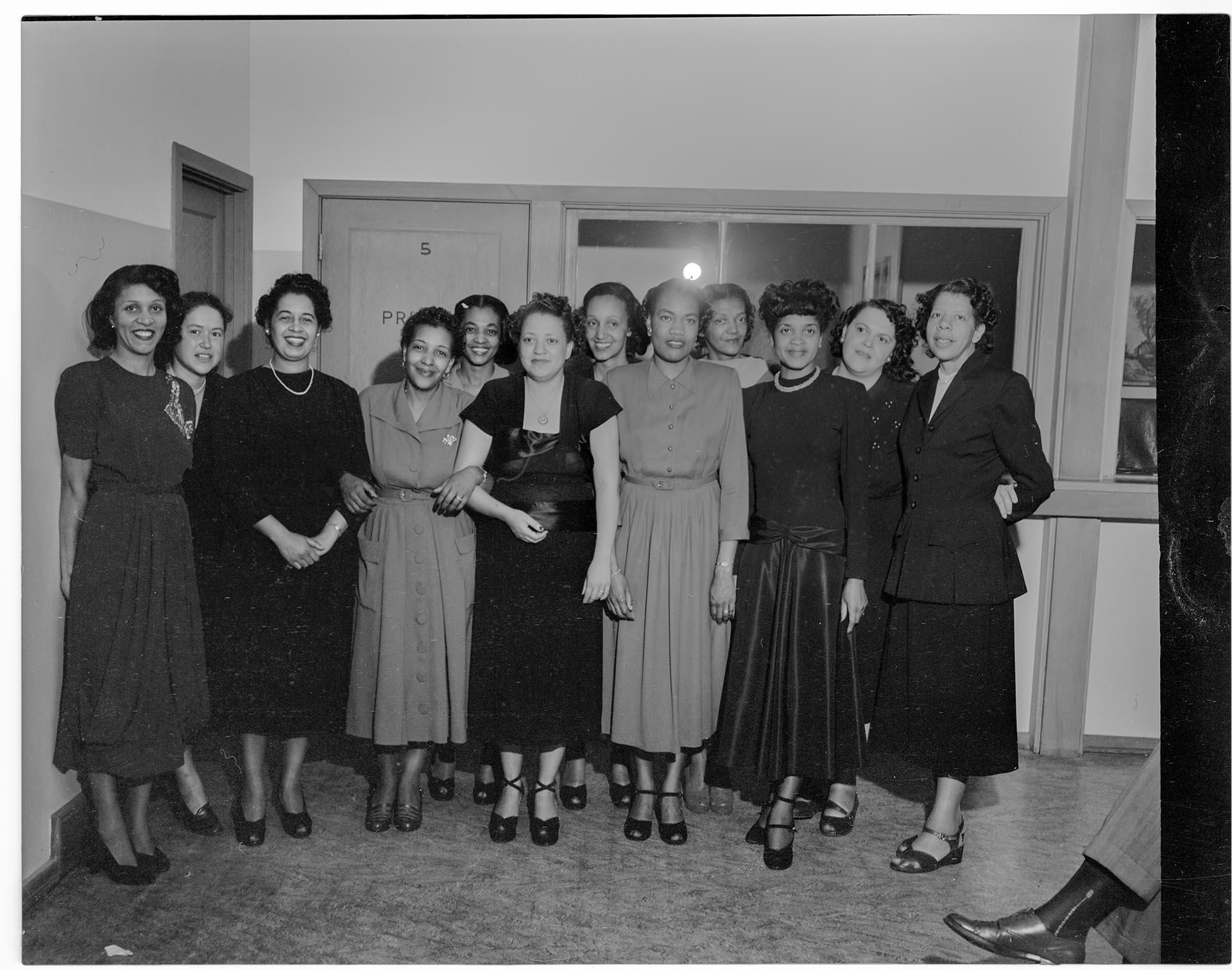 Image of Members of En Avante Social Club posing together, Seattle, circa 1949