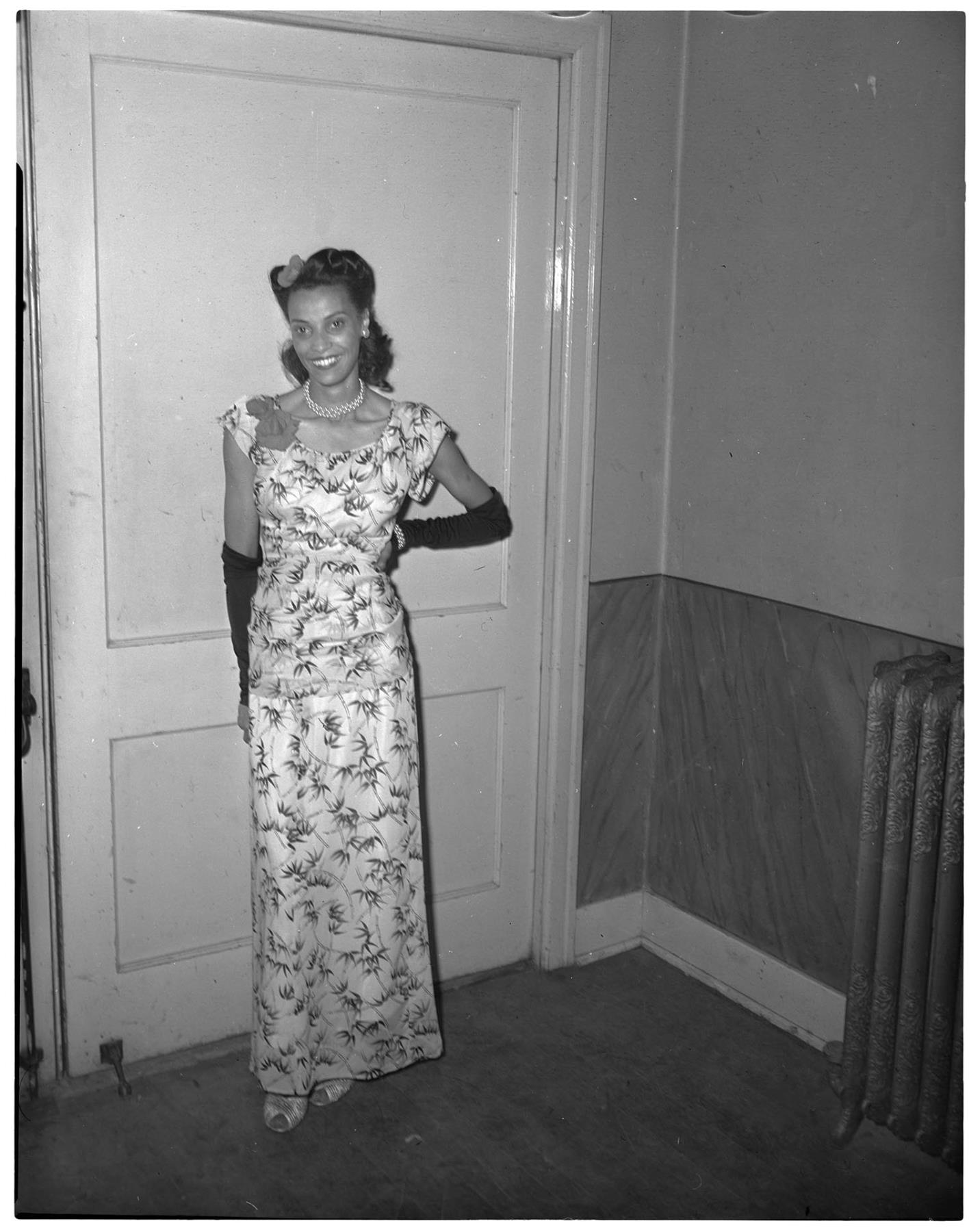 Image of Izzy Smith posing in gown, Seattle, circa 1949