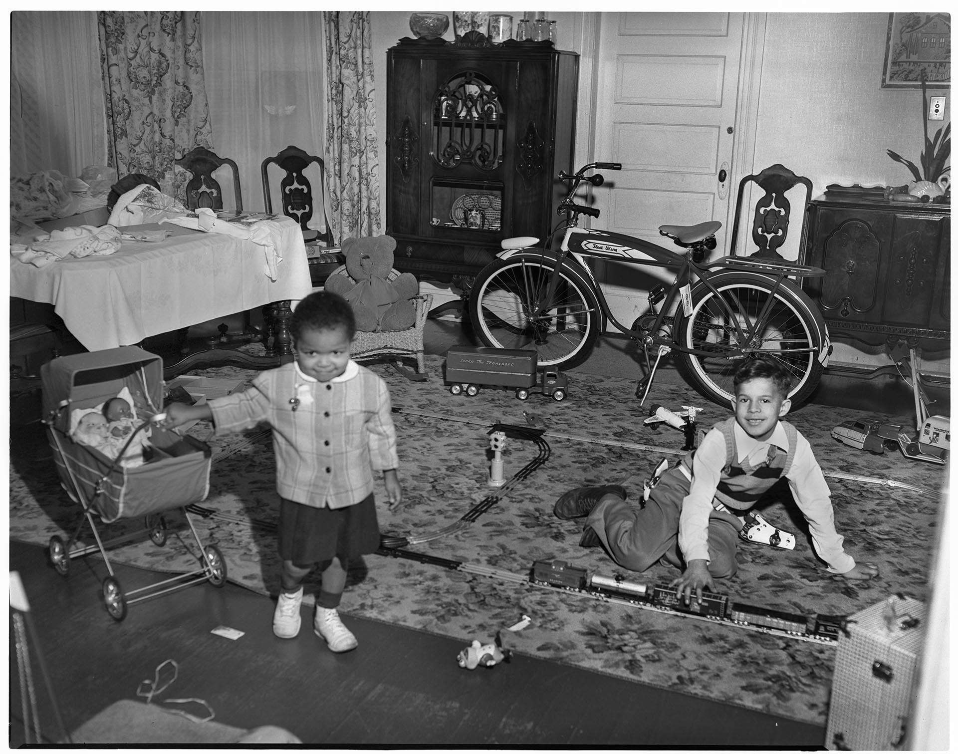 Image of Two children playing with toys, Seattle, circa 1950