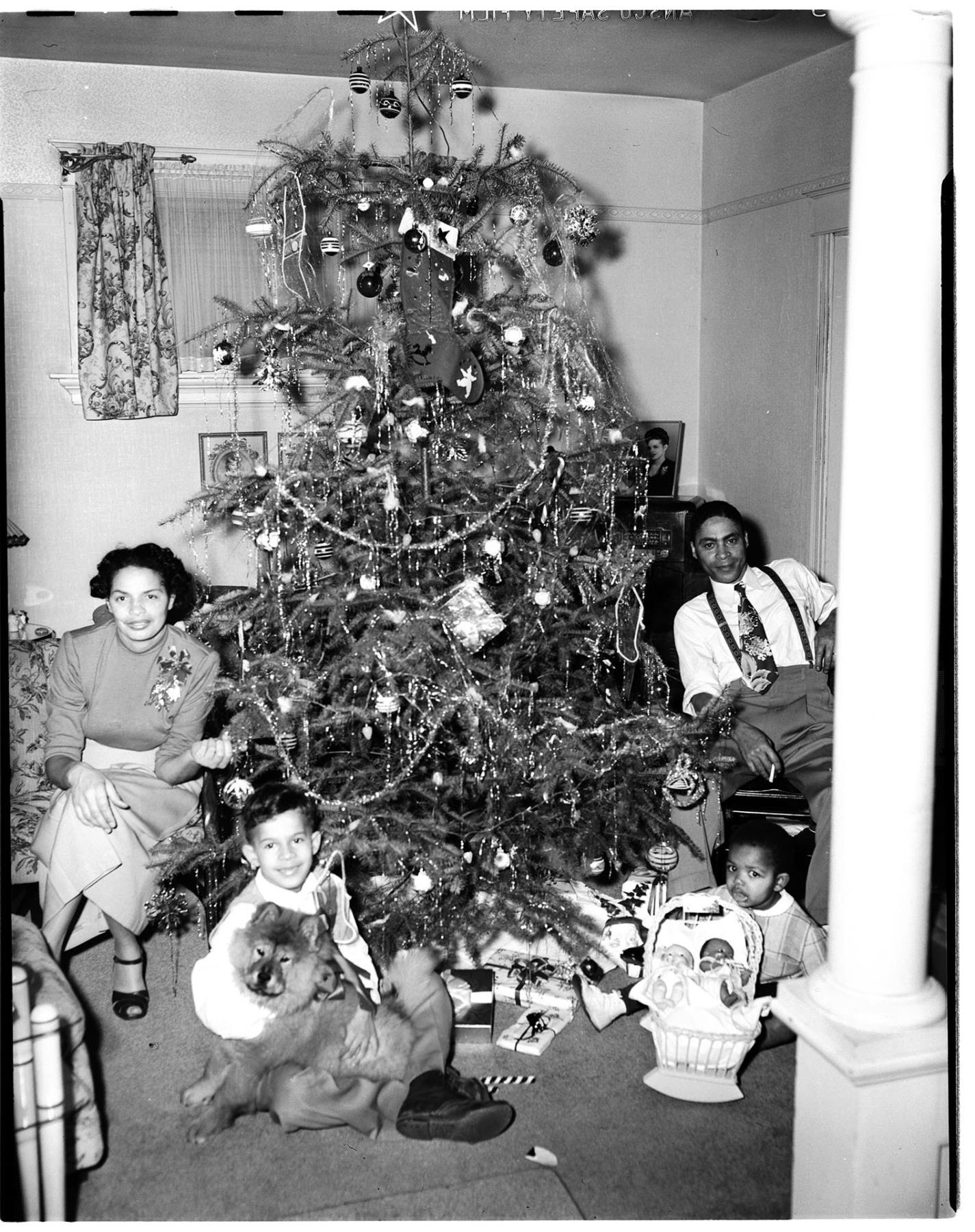 Image of Family around a Christmas tree, Seattle, circa 1950