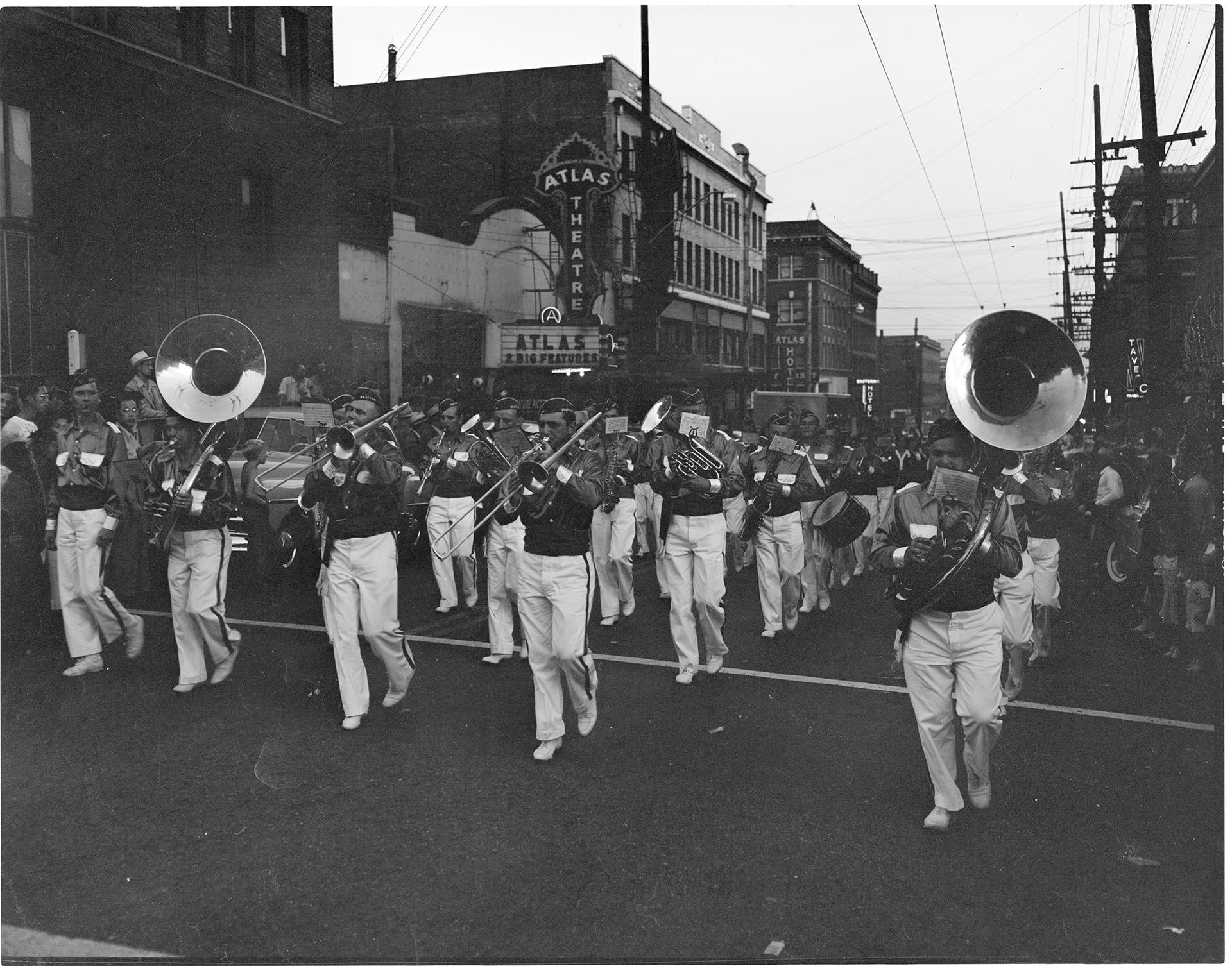 Image of Post Office band marching in a parade, Seattle, circa 1953