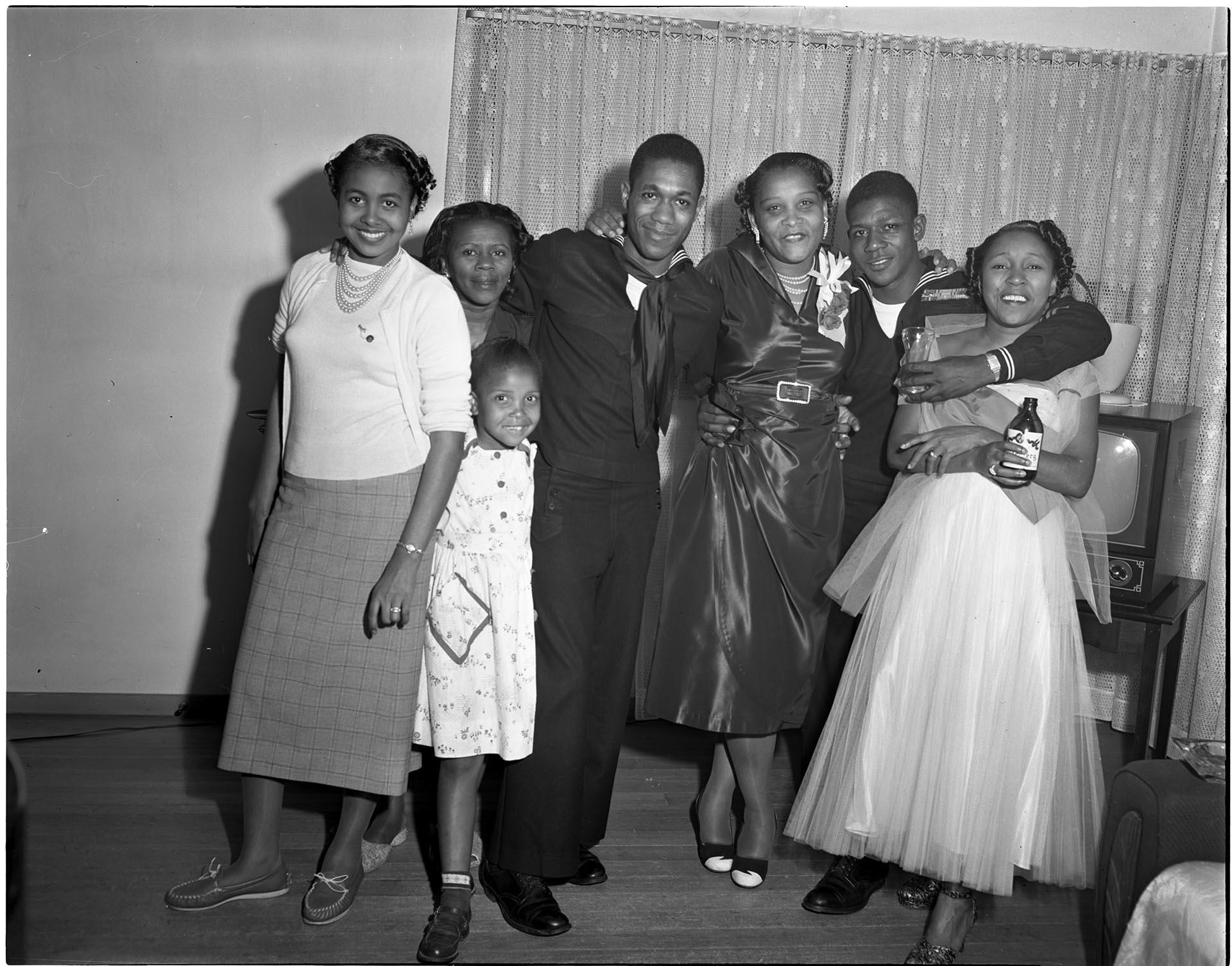 Image of Group posing in living room, Seattle, circa 1950