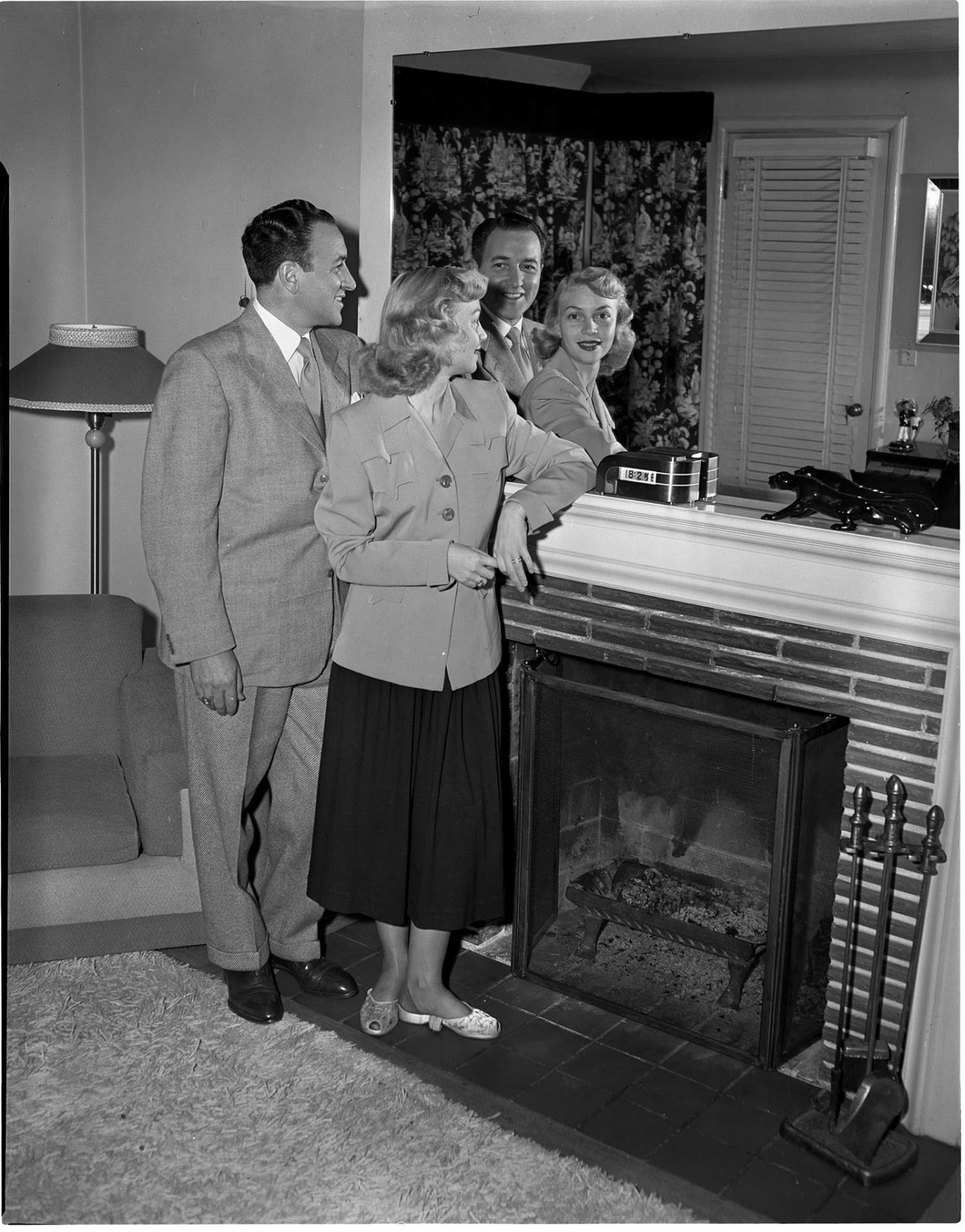Image of Italian Club President and wife in front of mirror, Seattle, circa 1950