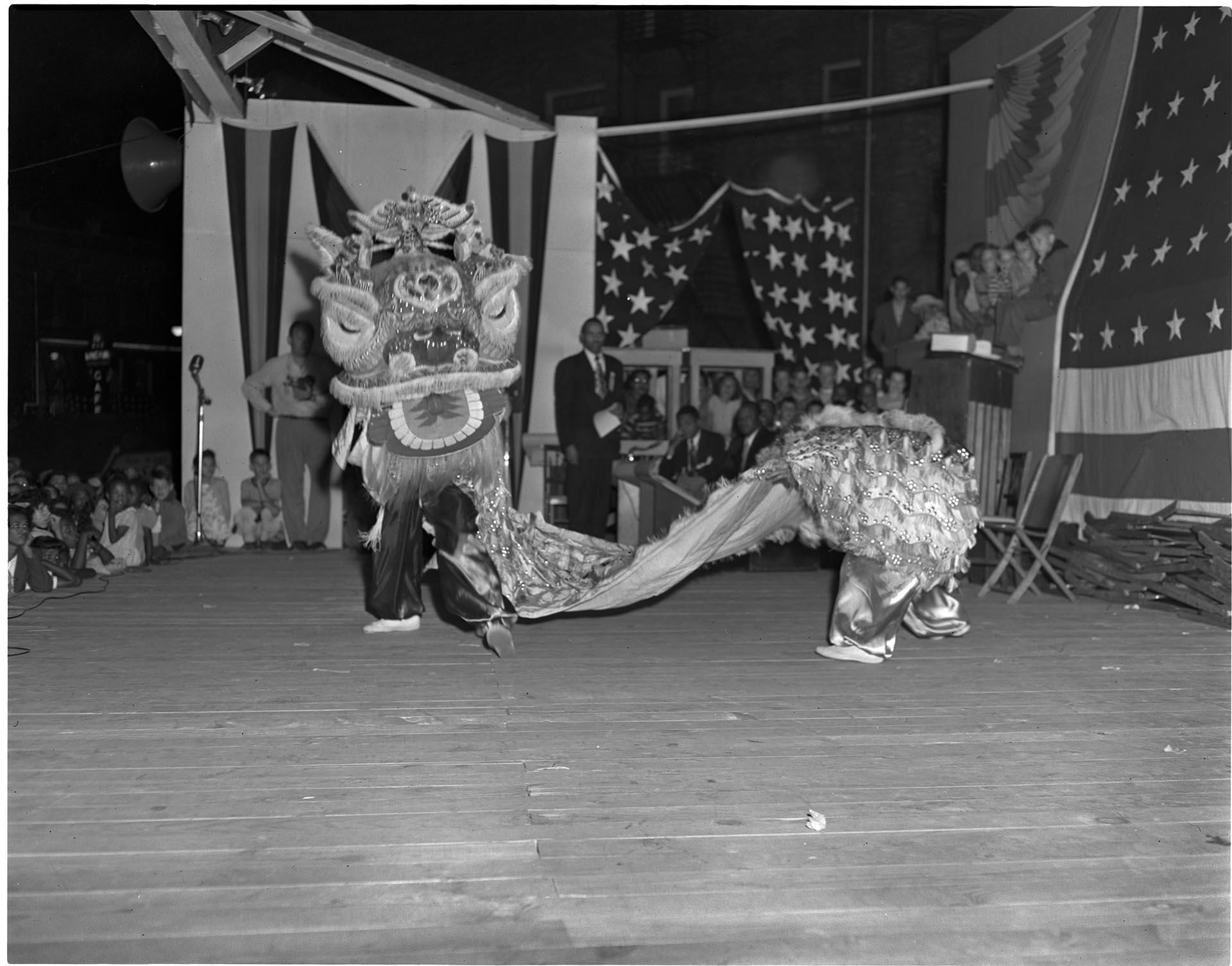 Image of Chinese dancers performing on stage, Seattle, circa 1953