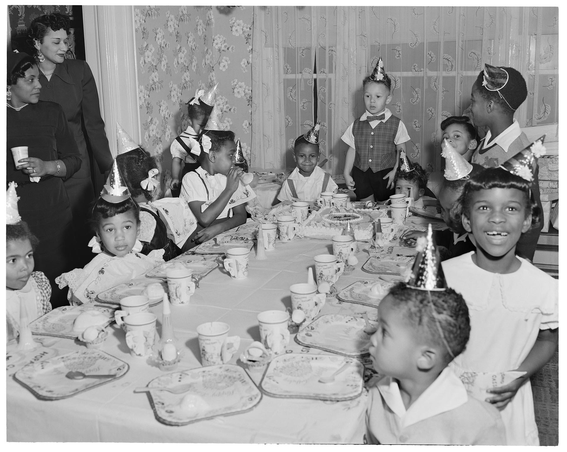 Image of Children around table at birthday party, Seattle, circa 1955