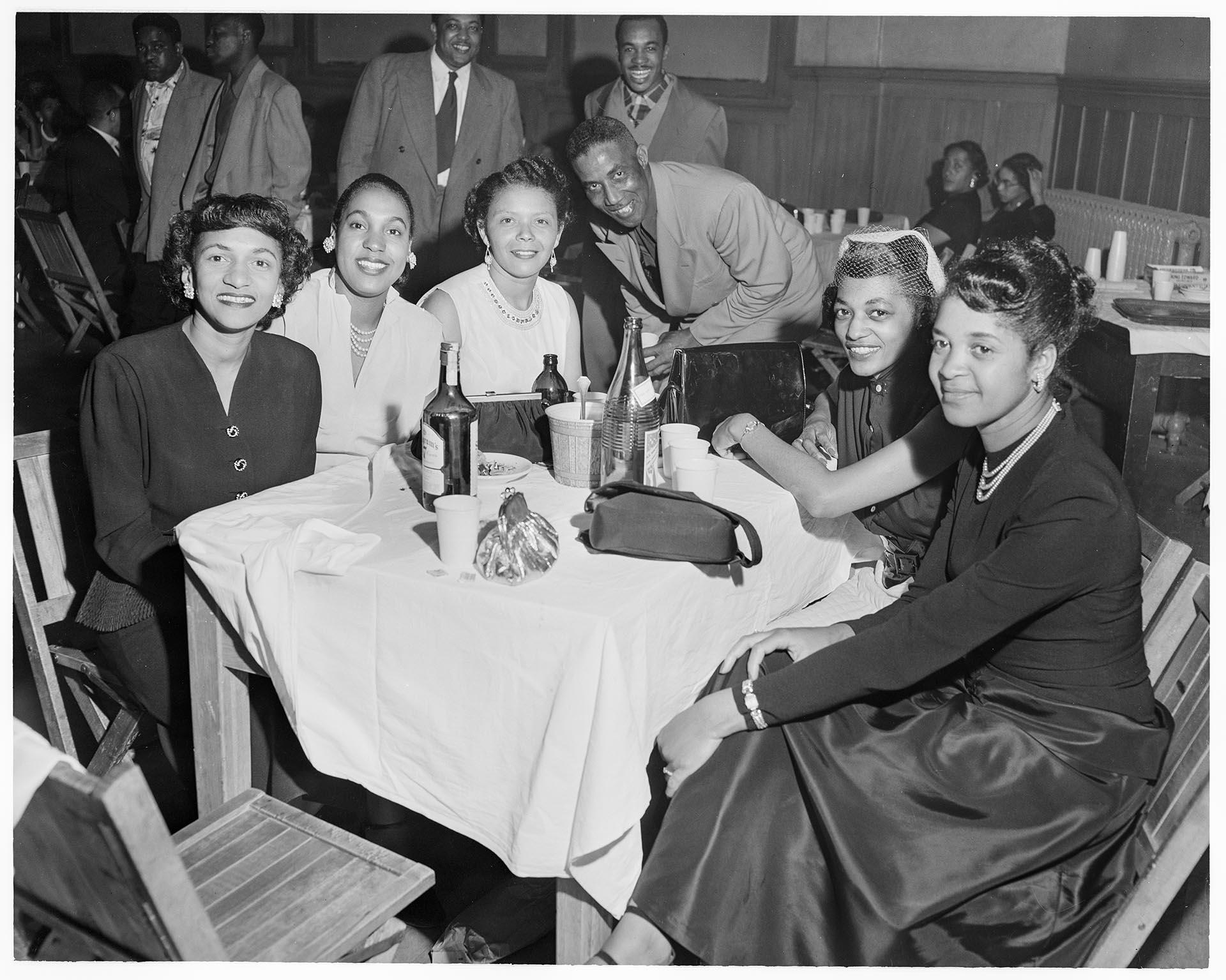 Image of Group around table at the Black & Tan, Seattle, circa 1947