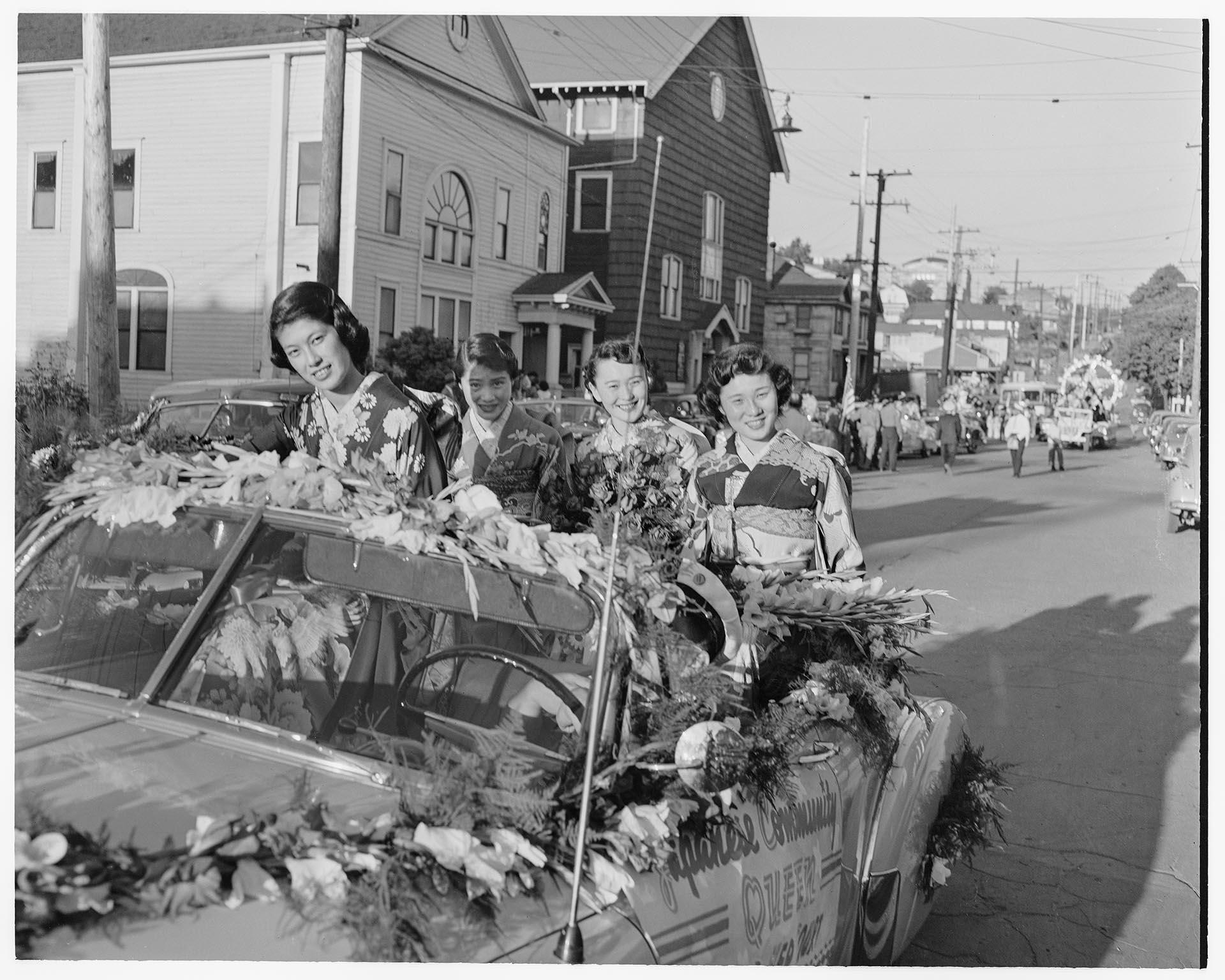 Image of Women riding in East Madison Seafair parade, Seattle, circa 1953