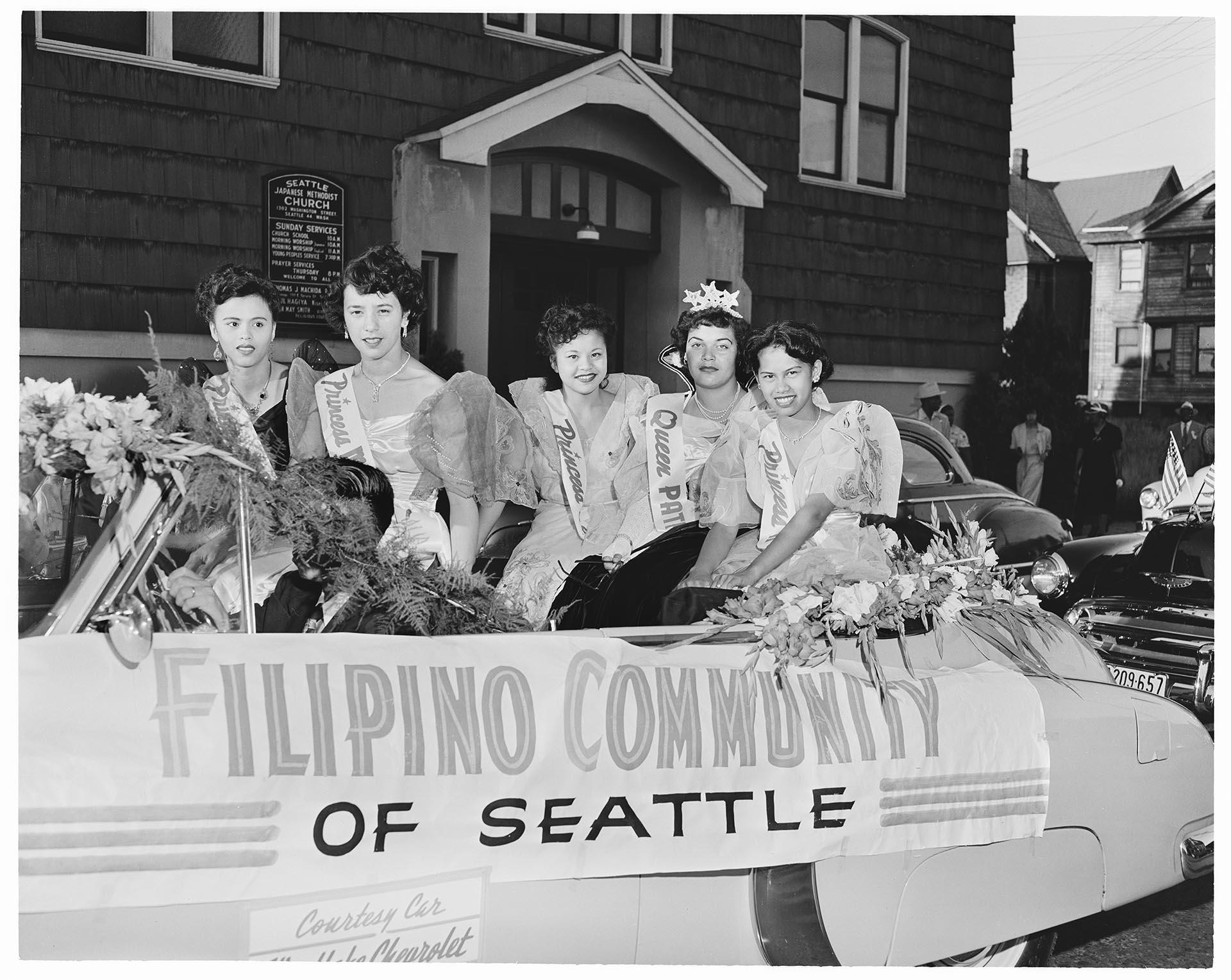 Image of Women riding in East Madison Seafair parade, Seattle, circa 1953