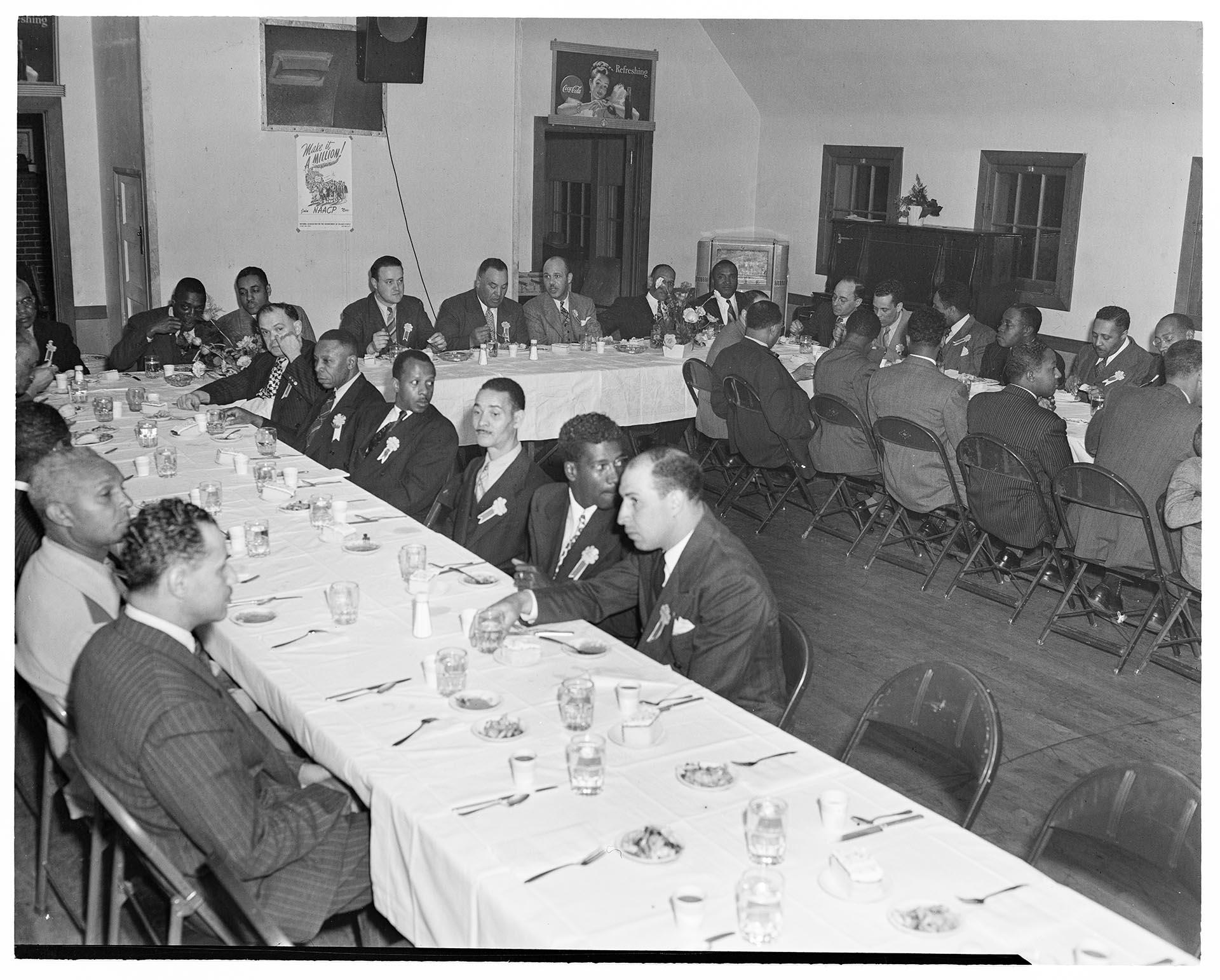 Image of Men sitting at YMCA banquet tables, Seattle, circa 1953