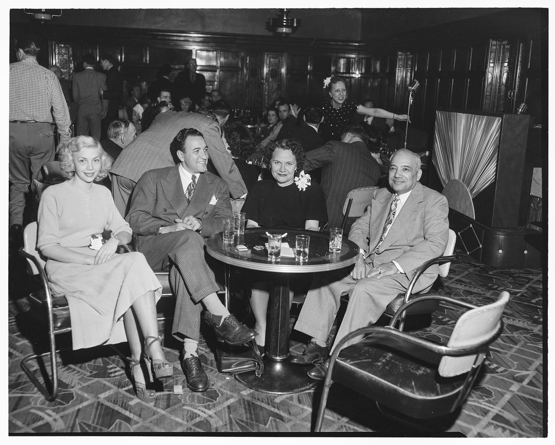 Image of Two couples at table at the Italian Club, Seattle, circa 1953