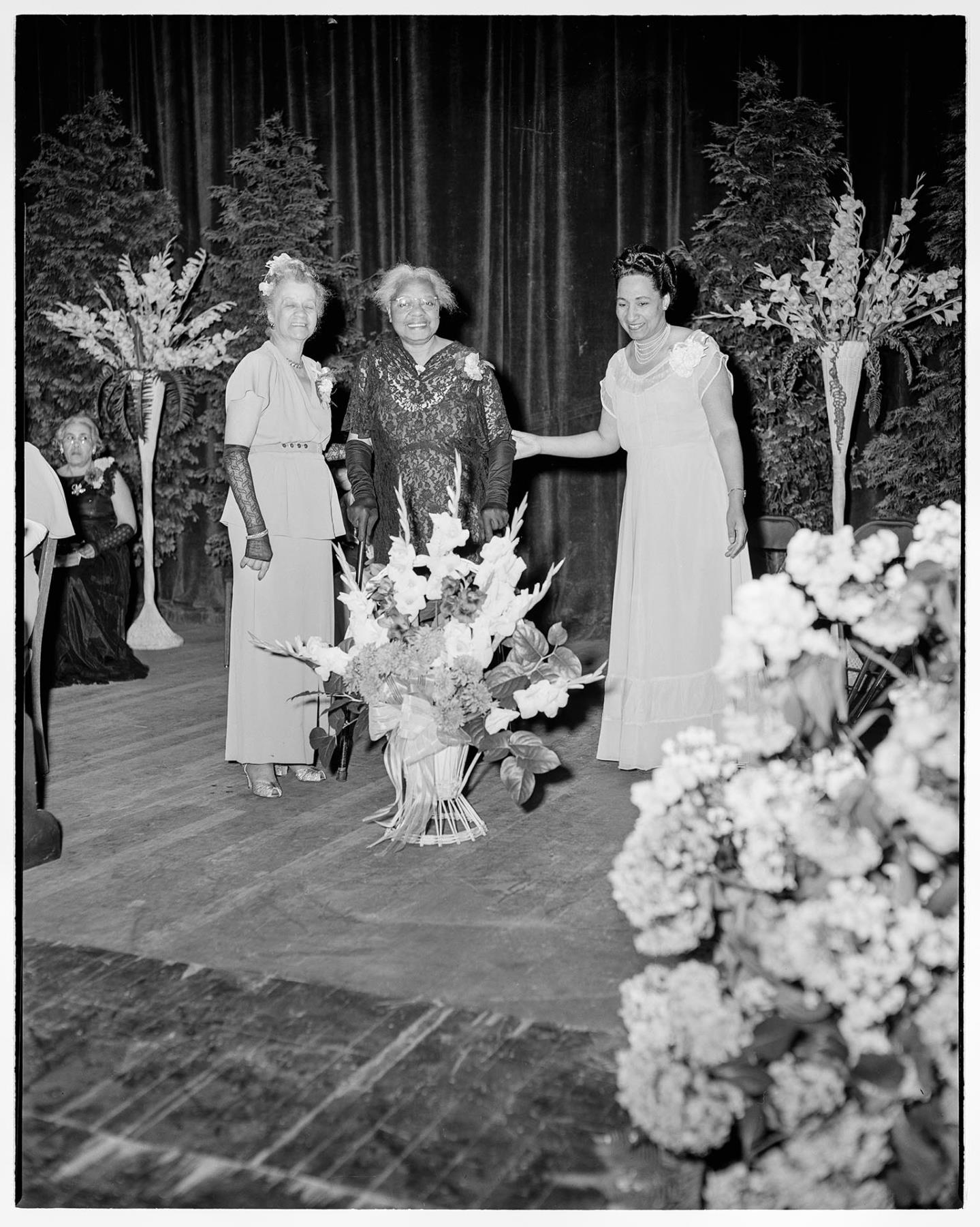 Image of NACWC delegates onstage at convention, Seattle, August 1948
