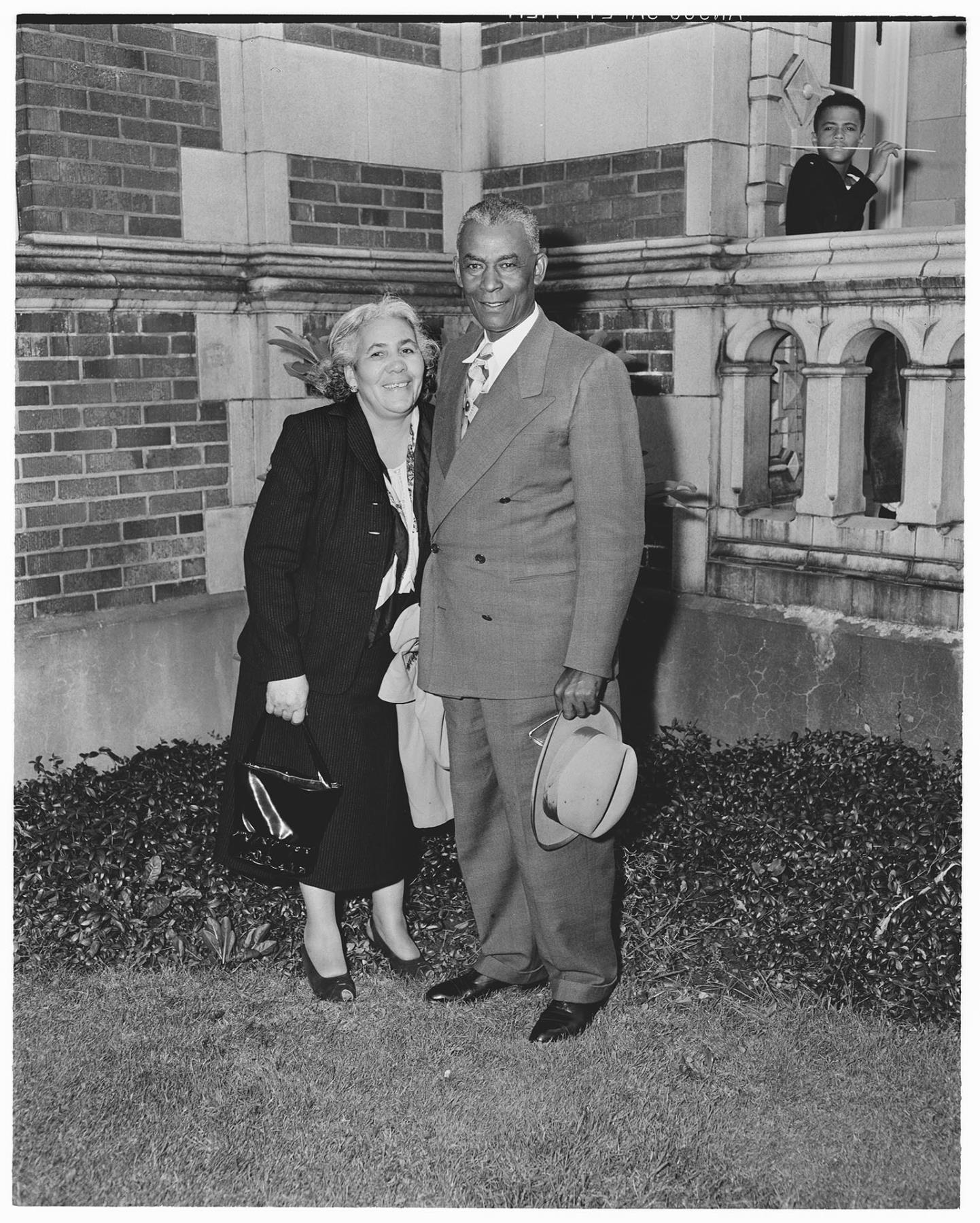 Image of Couple standing outside Garfield High School during NACWC convention, Seattle, August 1948