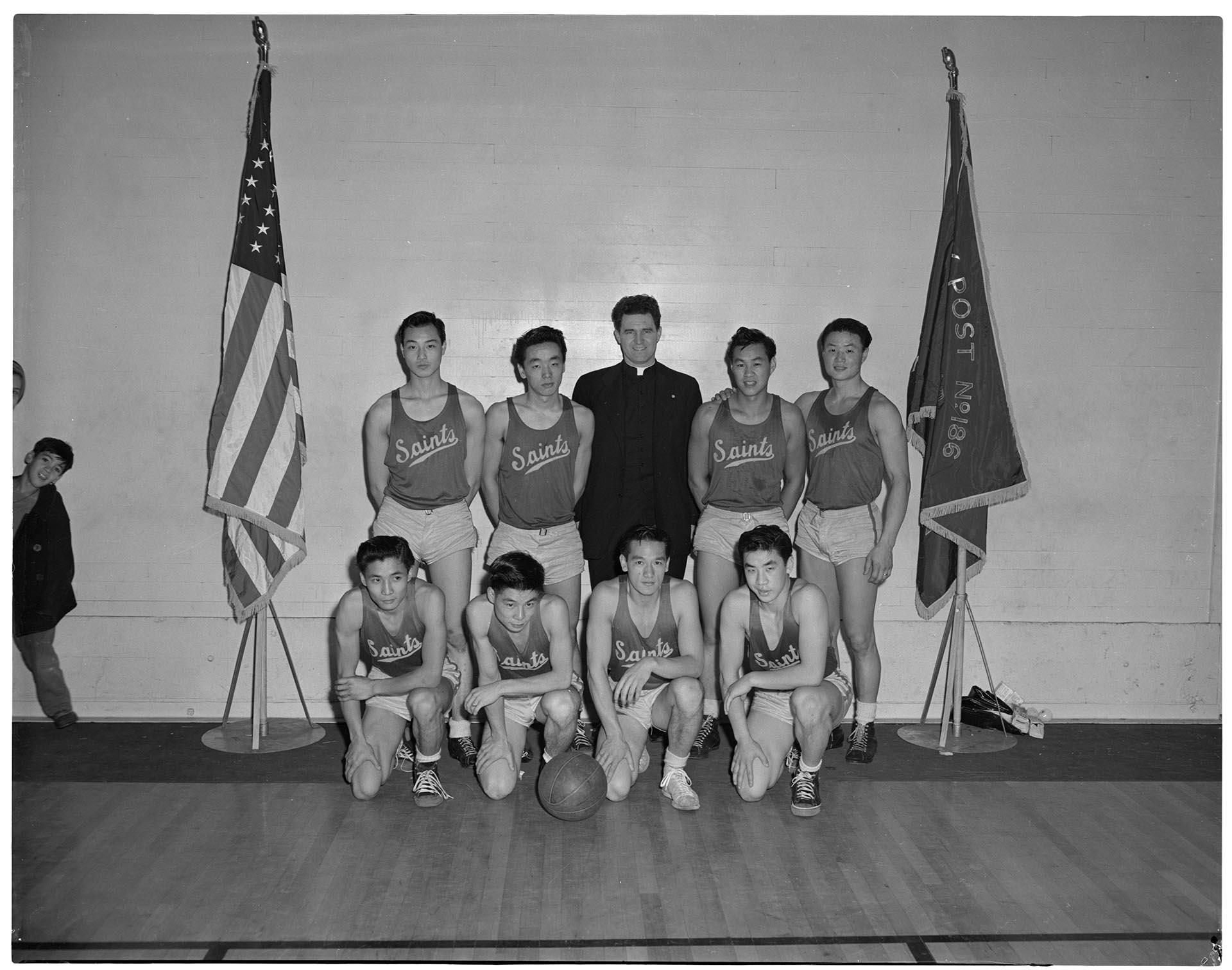 Image of San Francisco Saints basketball team posing for team photo, Seattle, December 1948