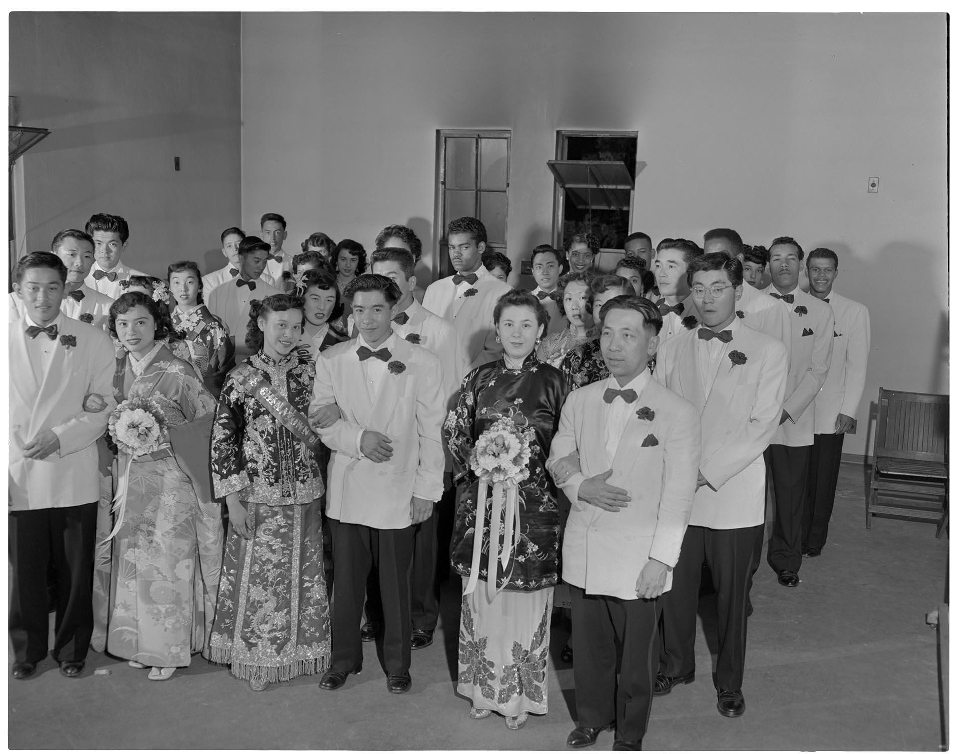 Image of Seafair royalty posing with their escorts, Seattle, July 23, 1951