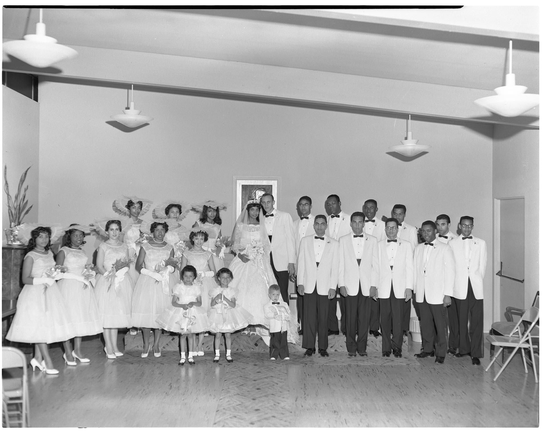 Image of Wedding party posing at church, Seattle, circa 1953