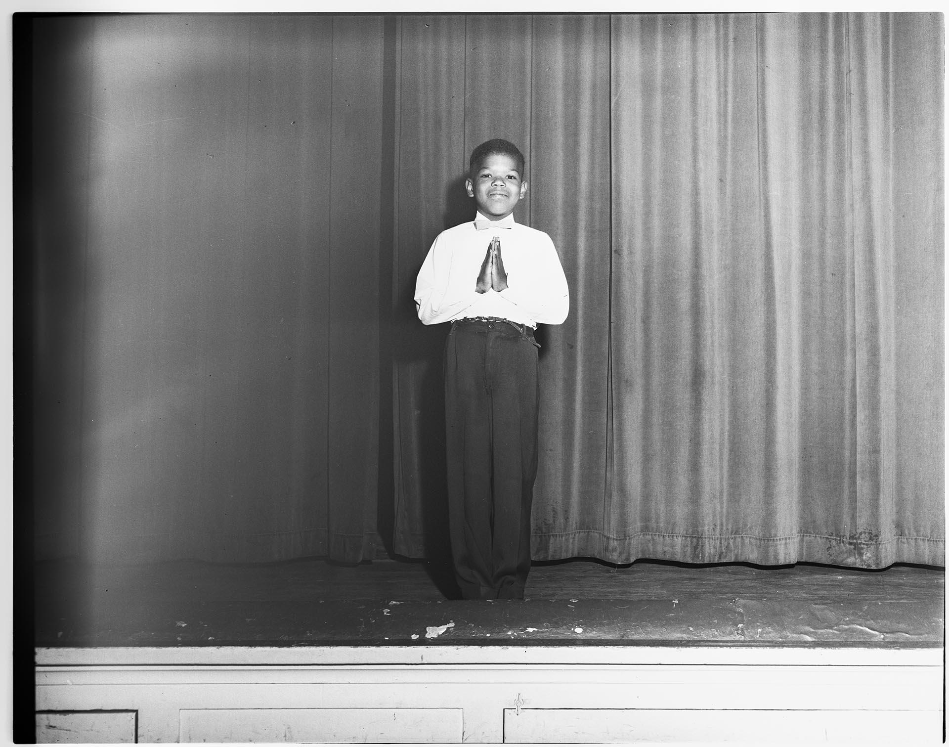 Image of Boy posing on stage after First Communion, Seattle, circa 1953
