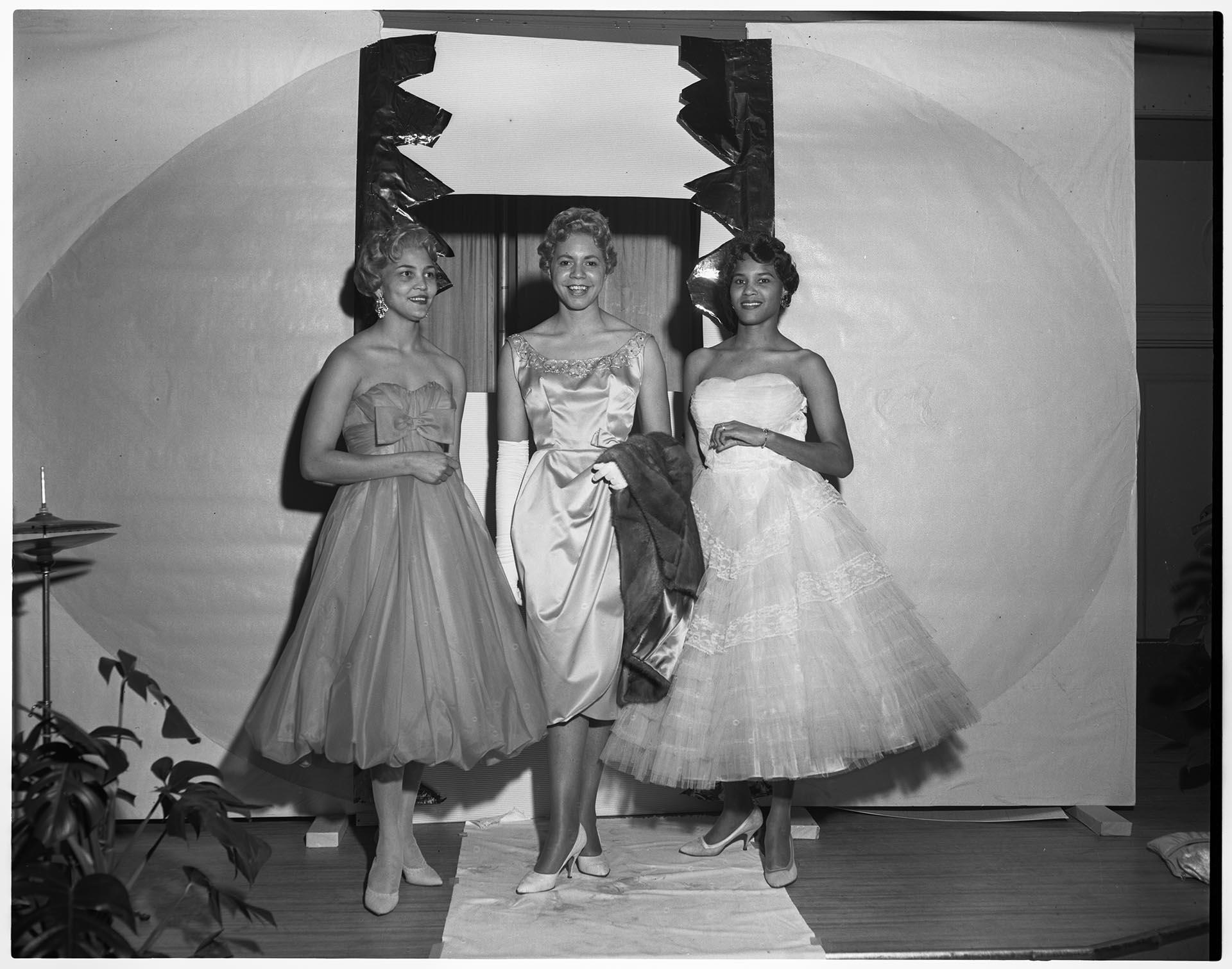 Three women modeling dresses at fashion show, Seattle, circa 1953  Museum  of History & Industry
