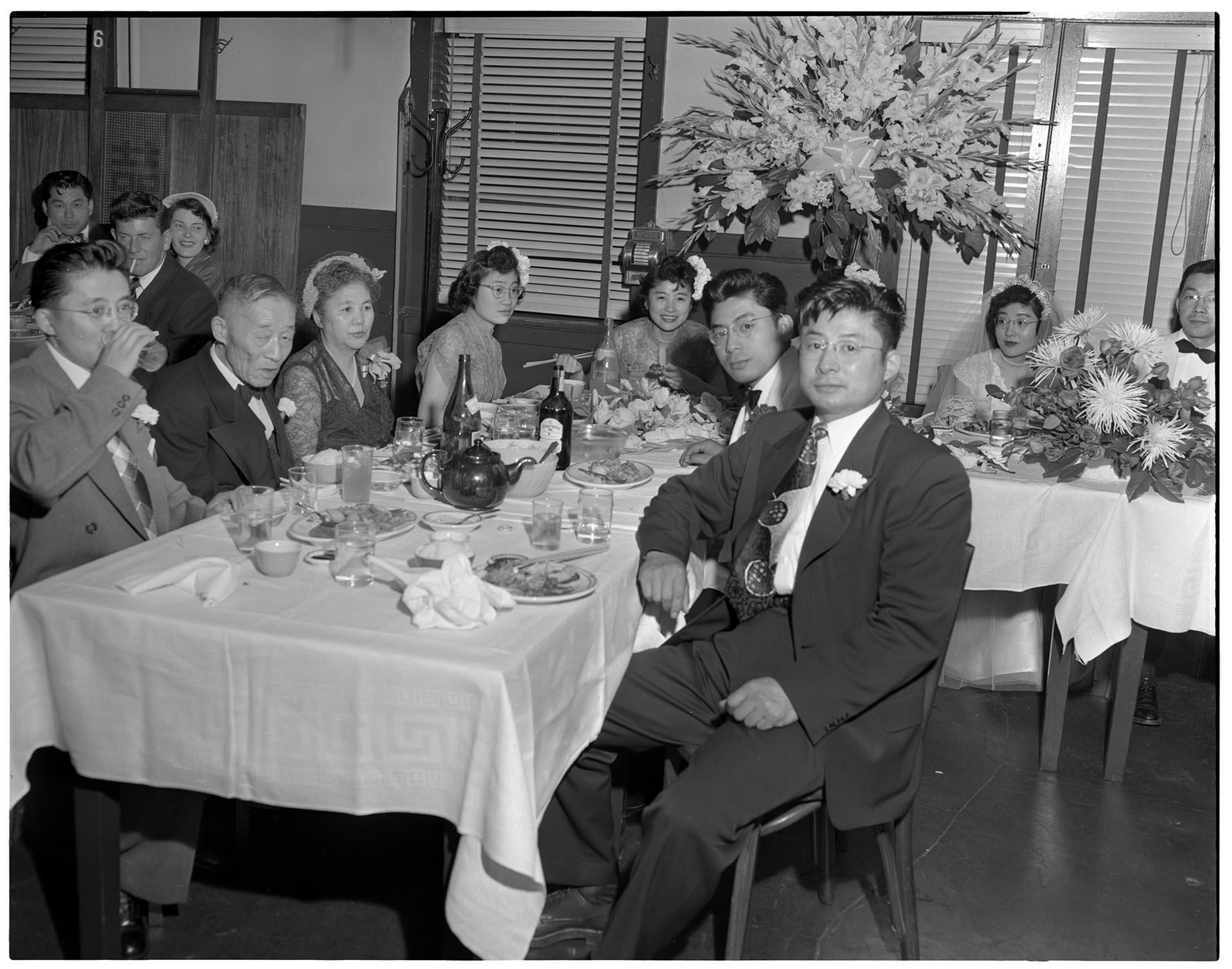 Image of Guests around table at wedding reception, Seattle, circa 1953