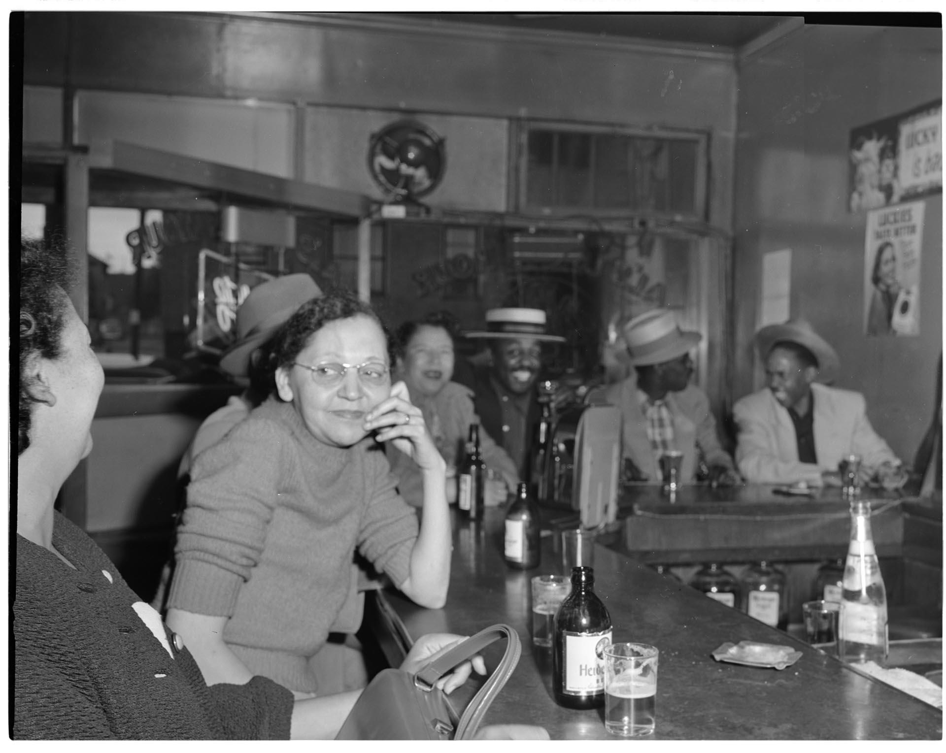Image of Patrons talking at a beer parlor, Seattle, circa 1953