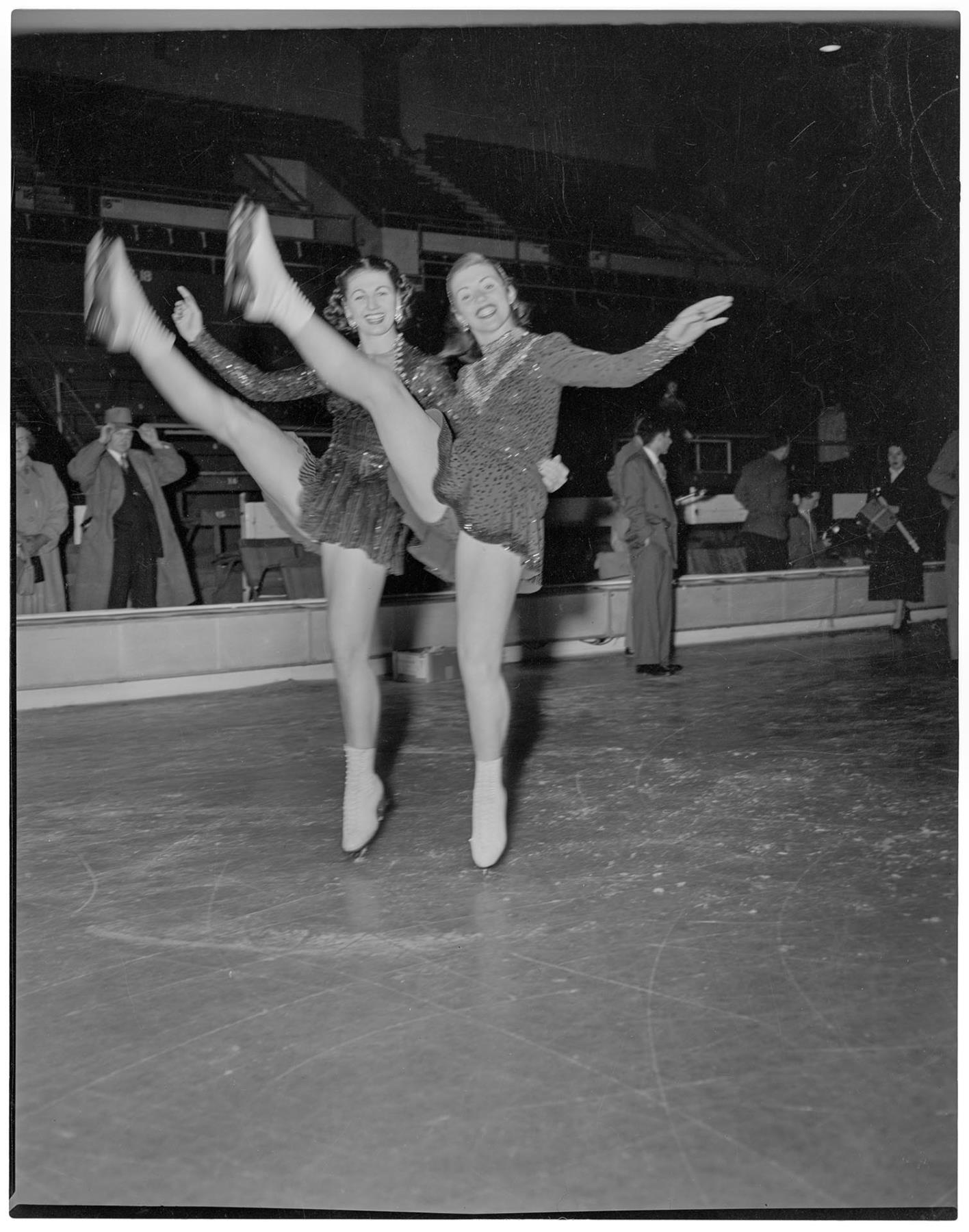 Image of Figure skaters posing on ice rink, Seattle, circa 1953