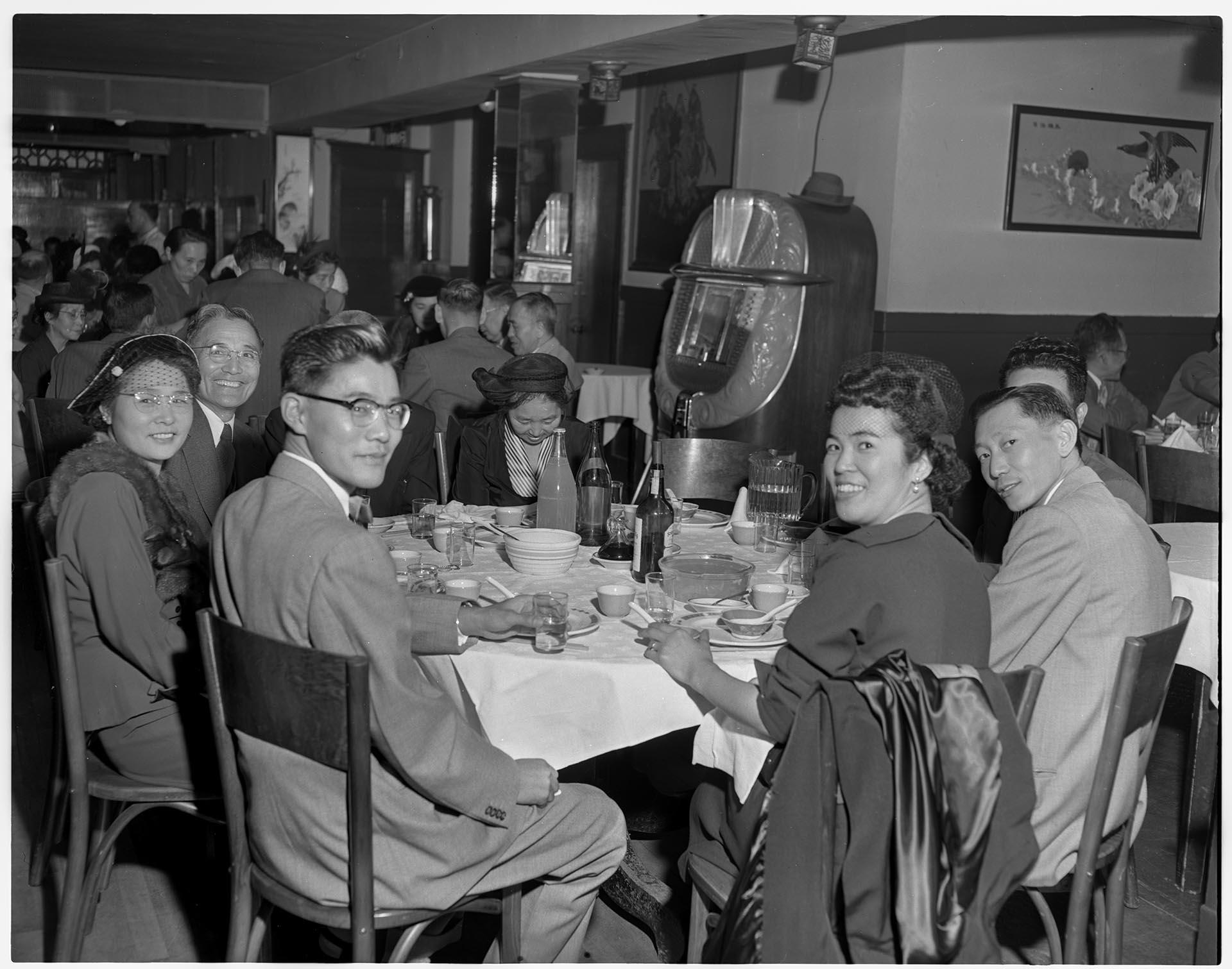 Image of Diners around table at Chinese restaurant, Seattle, circa 1953