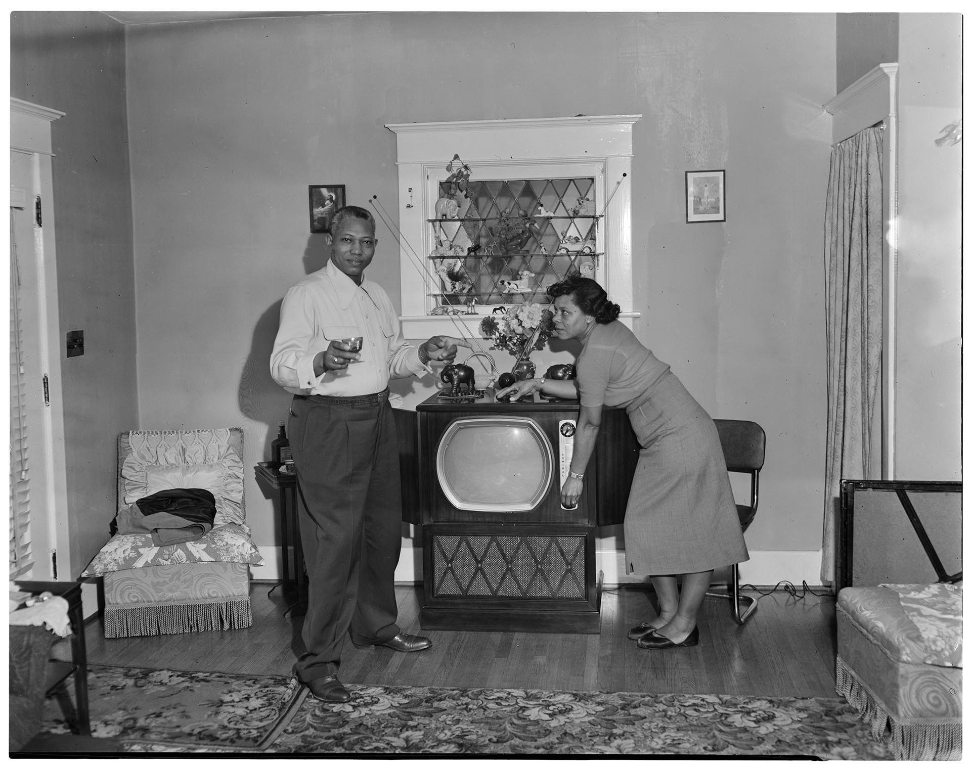Image of Couple with television set in living room, Seattle, circa 1953