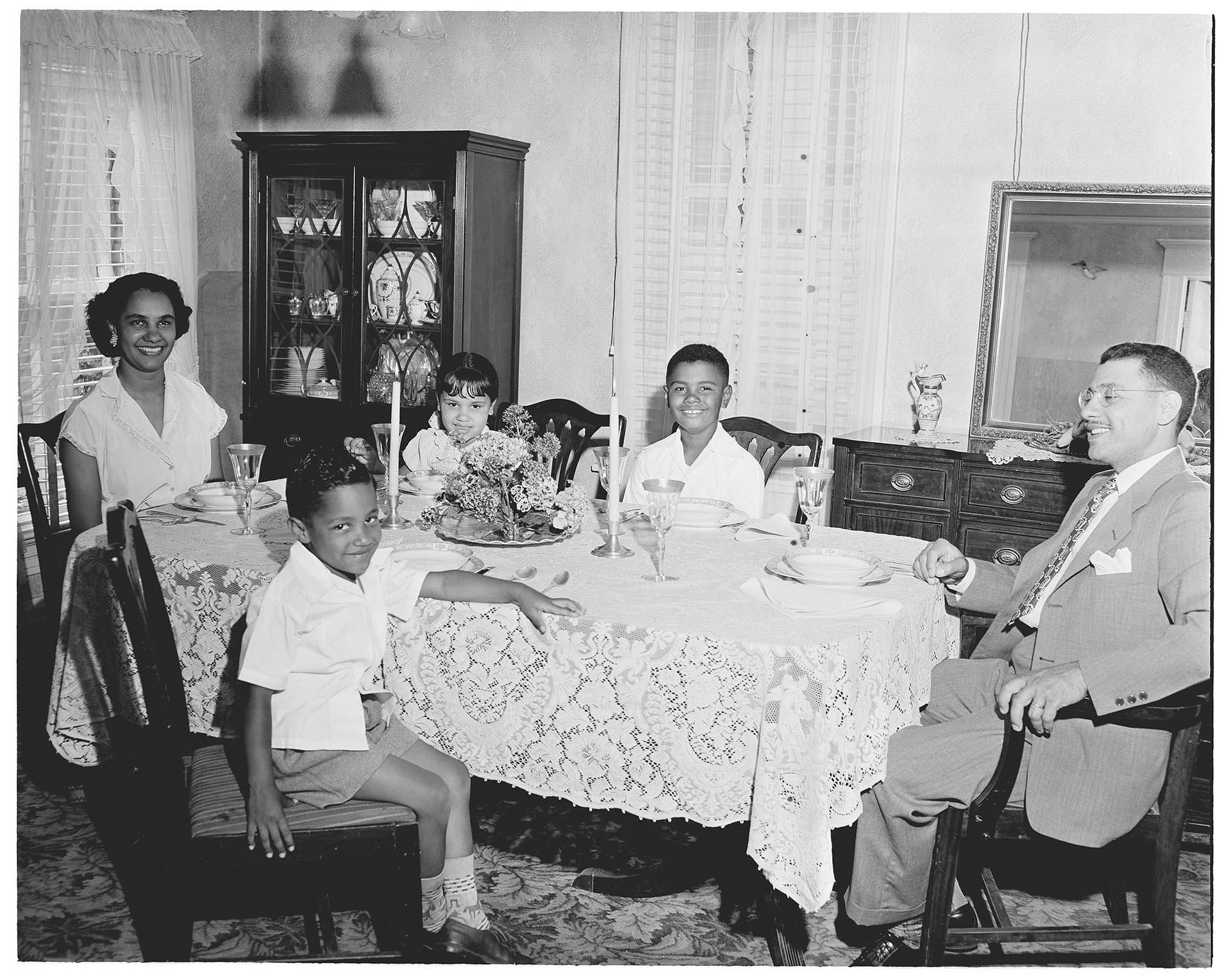 Image of Wilcox family at dinner, Seattle, July 22, 1950