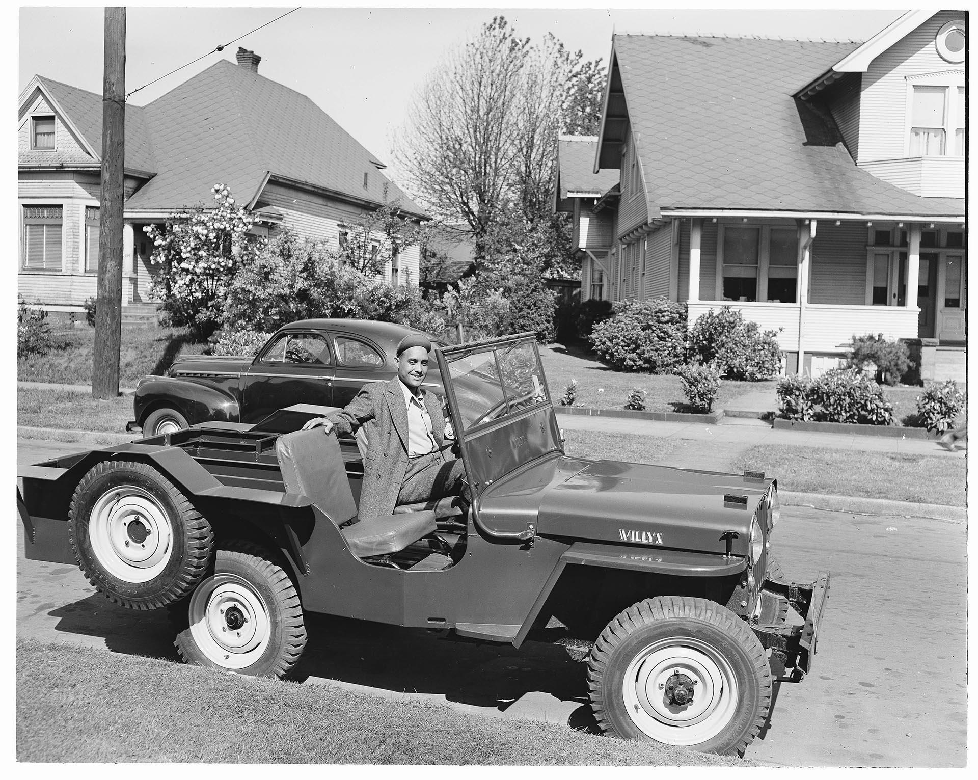 Image of Joe Smith sitting in Jeep, Seattle, circa 1947