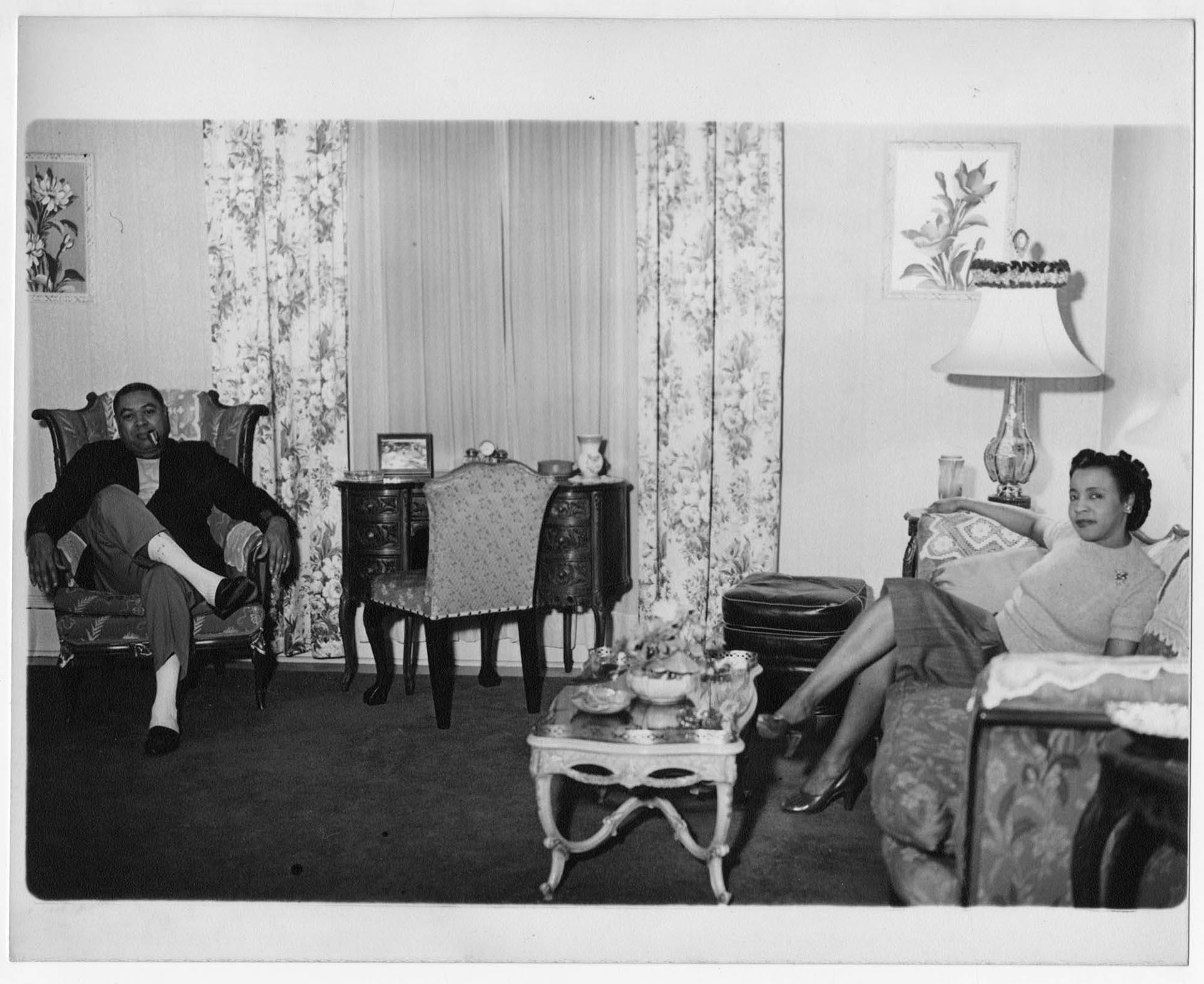 Image of Man and woman seated in a living room, Seattle, circa 1956