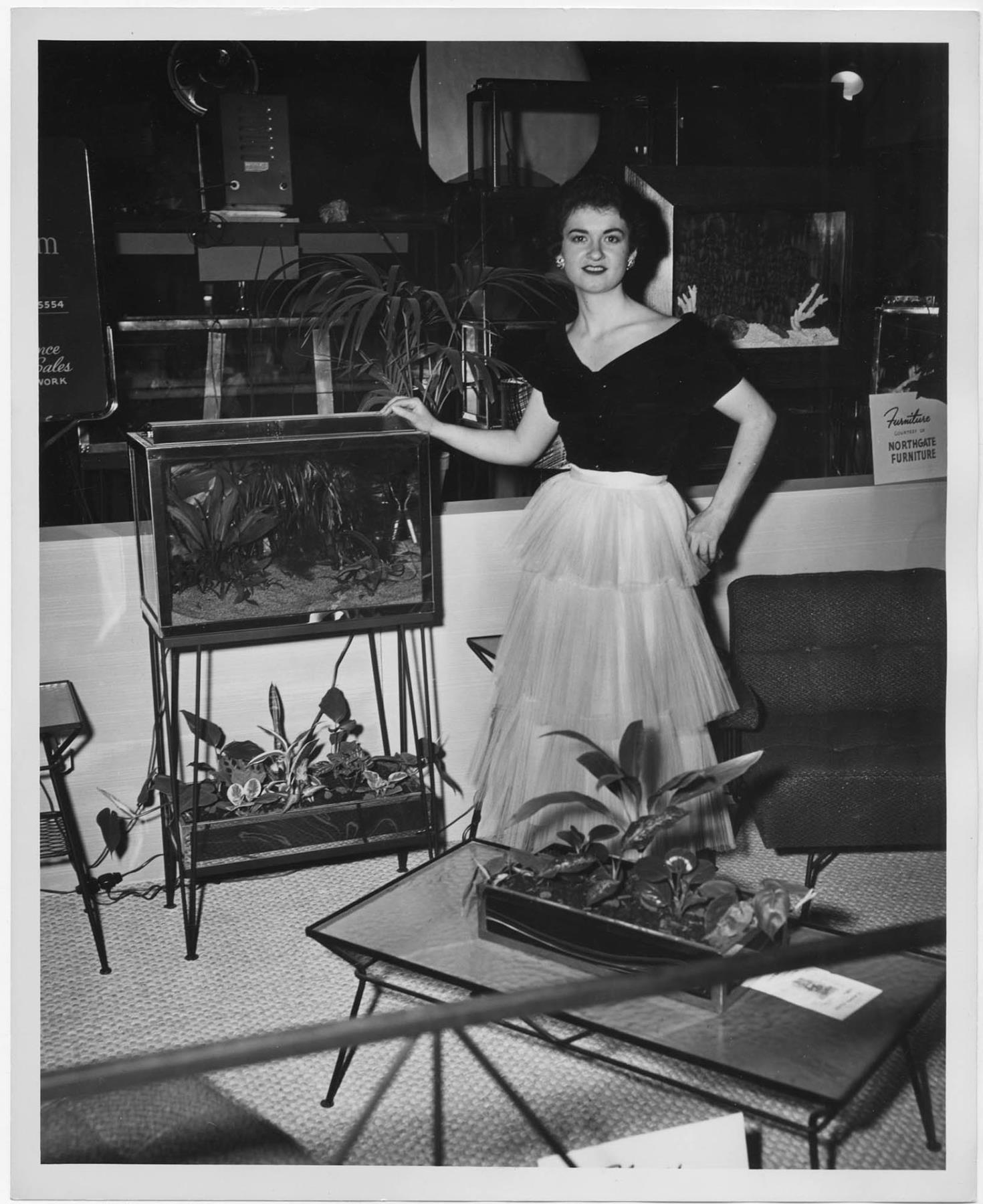 Image of Woman with an aquarium, Seattle, circa 1955