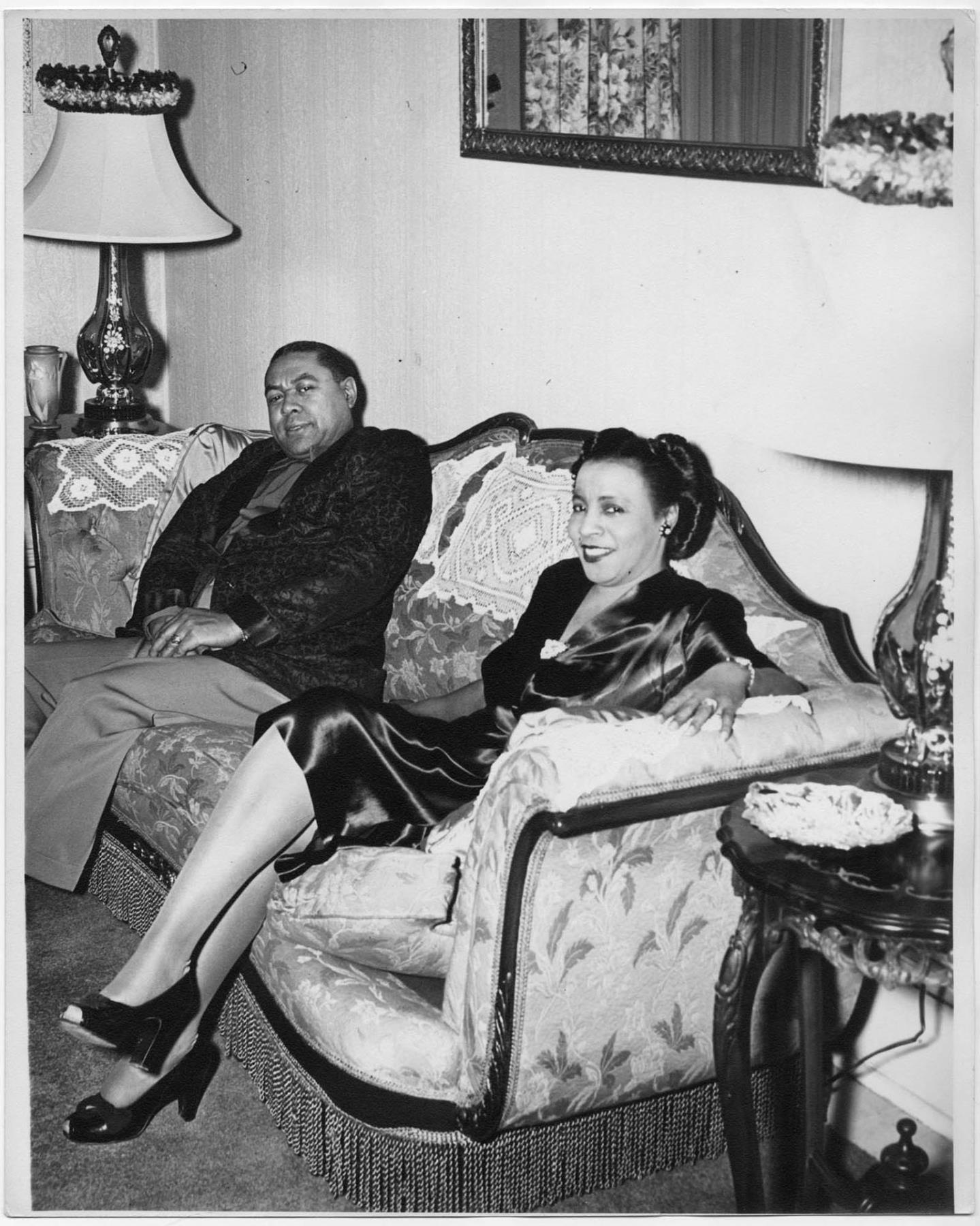 Image of Man and woman seated in a living room, Seattle, circa 1955