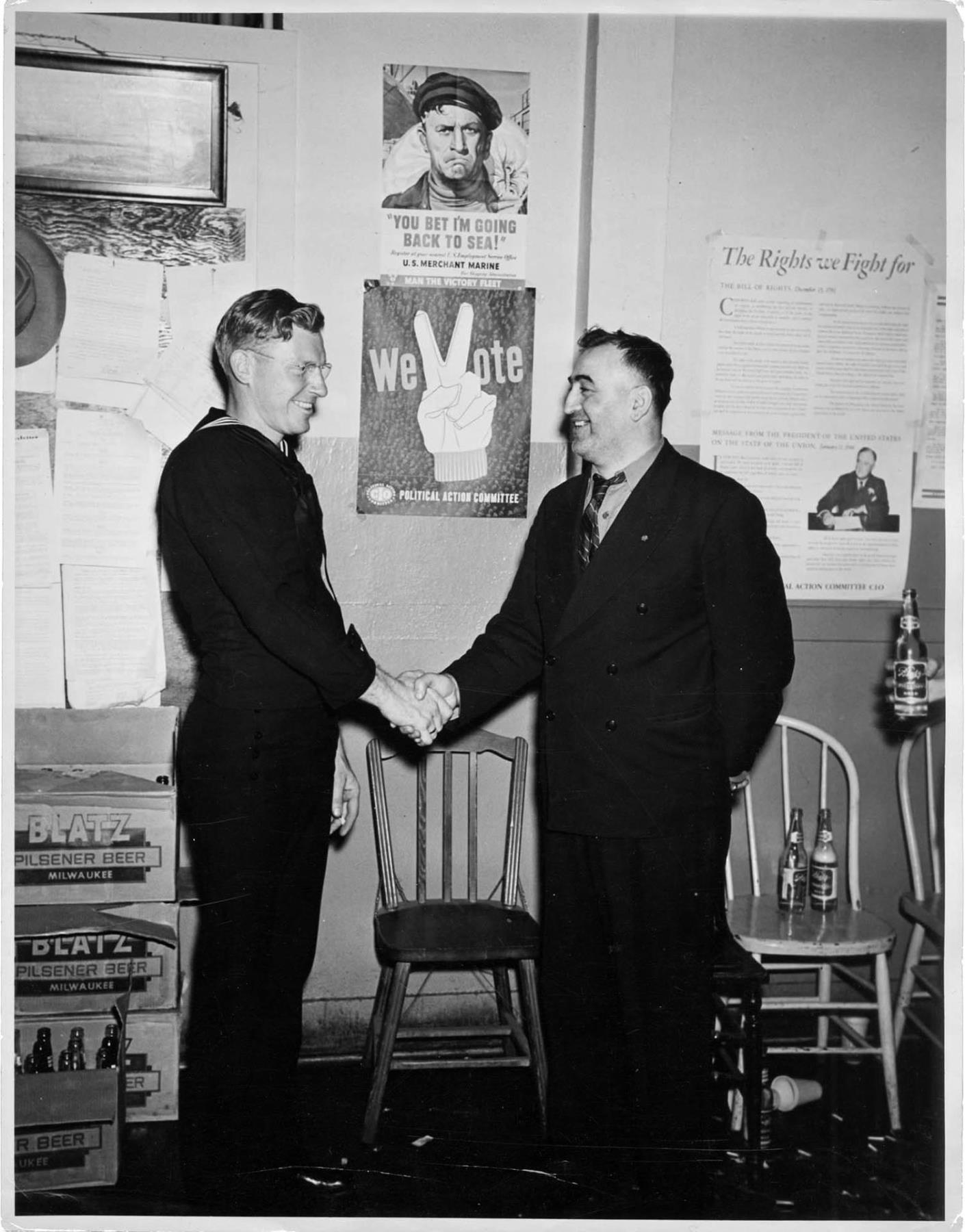 Image of Two men shaking hands, circa 1944