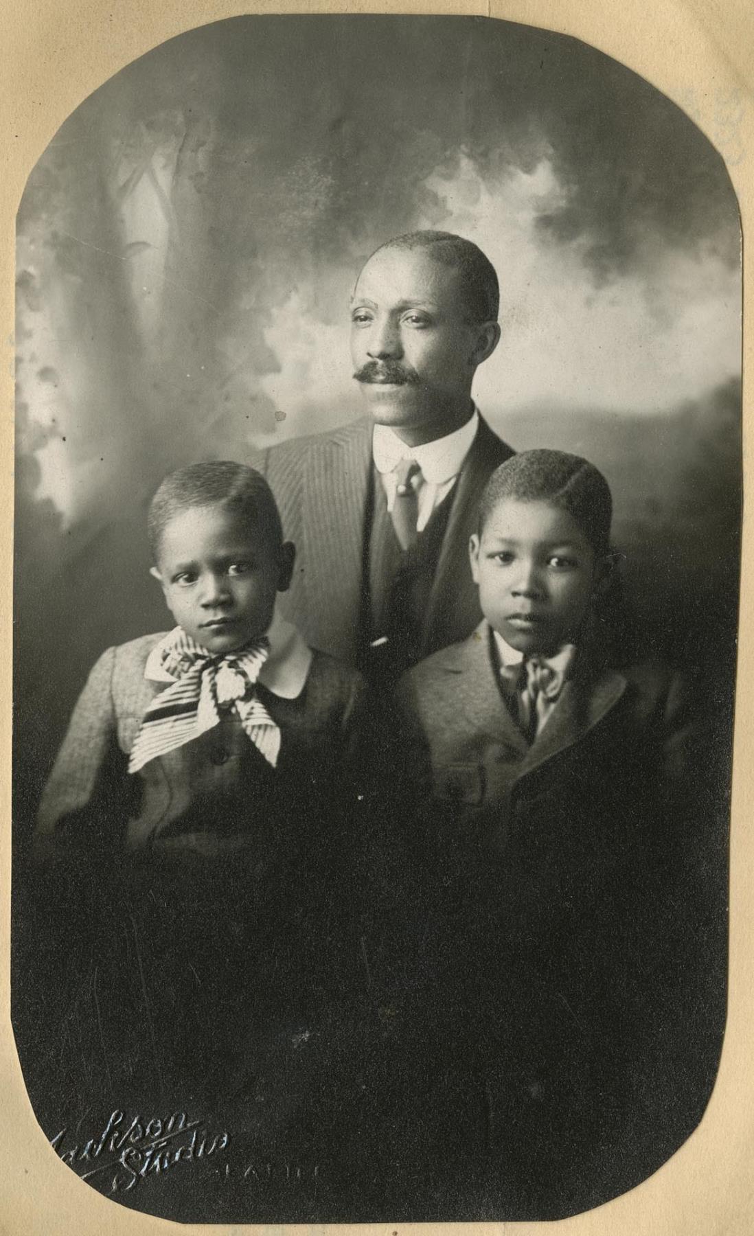 Image of James Sr., Jimmy, and Wayne Adams, circa 1917