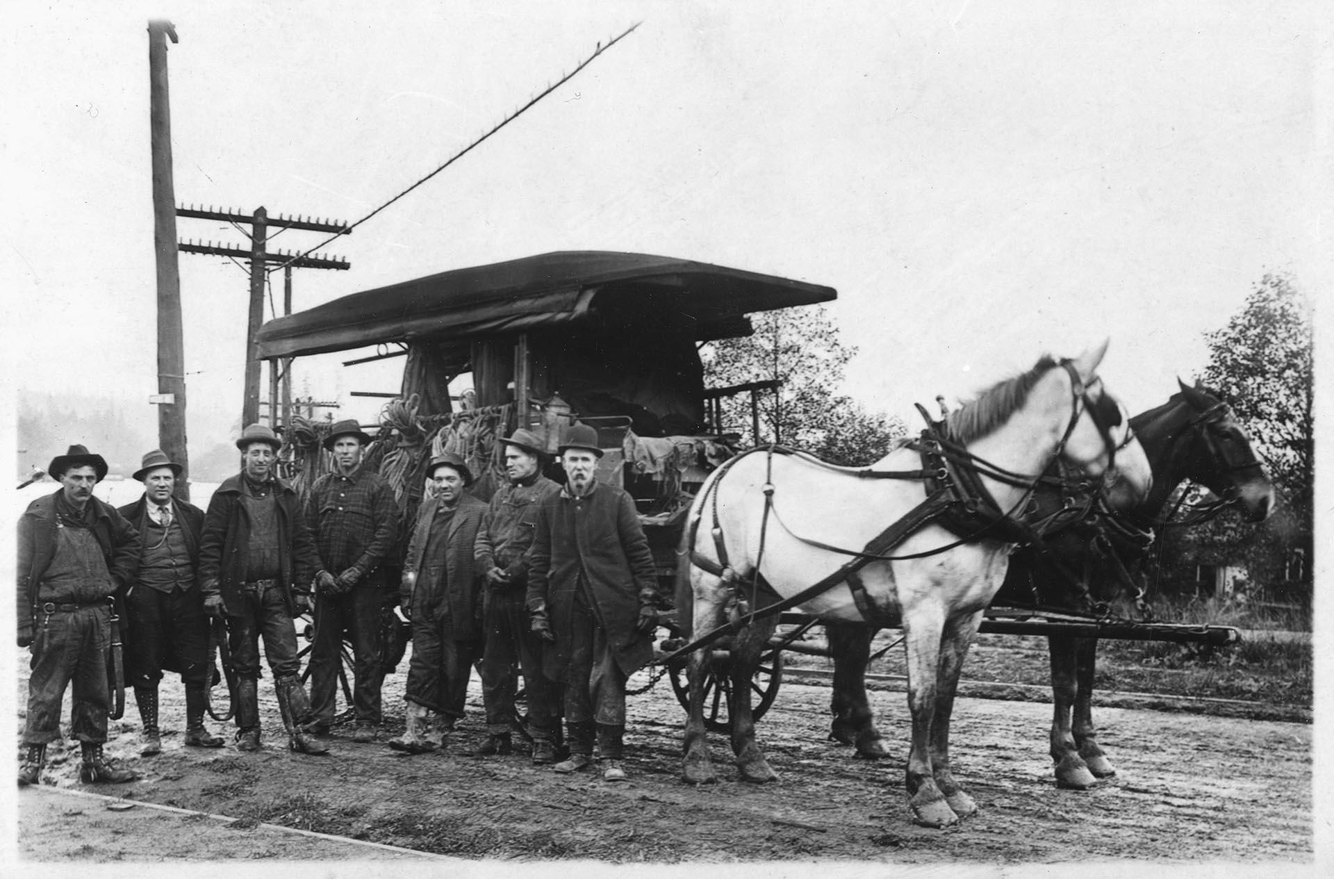 Image of Seattle City Light line crew with horse-drawn wagon, January 1914
