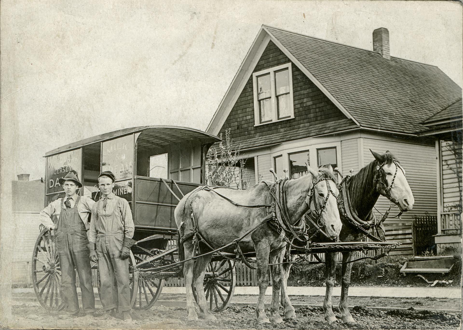 Image of Woodland Dairy employees and delivery cart, Seattle, circa 1912