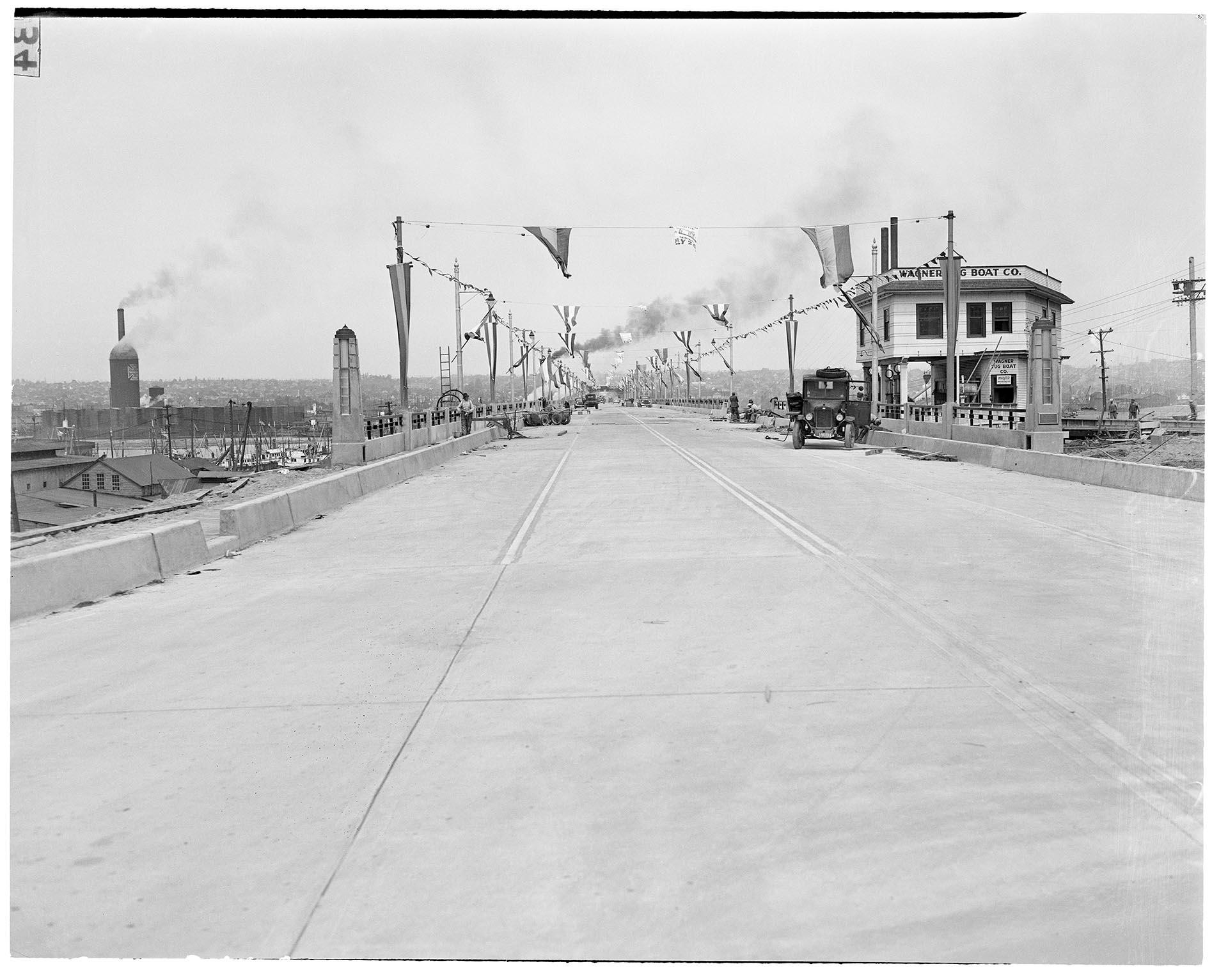 Image of Decorating  Ballard Bridge for reopening celebration, Seattle, May 1940