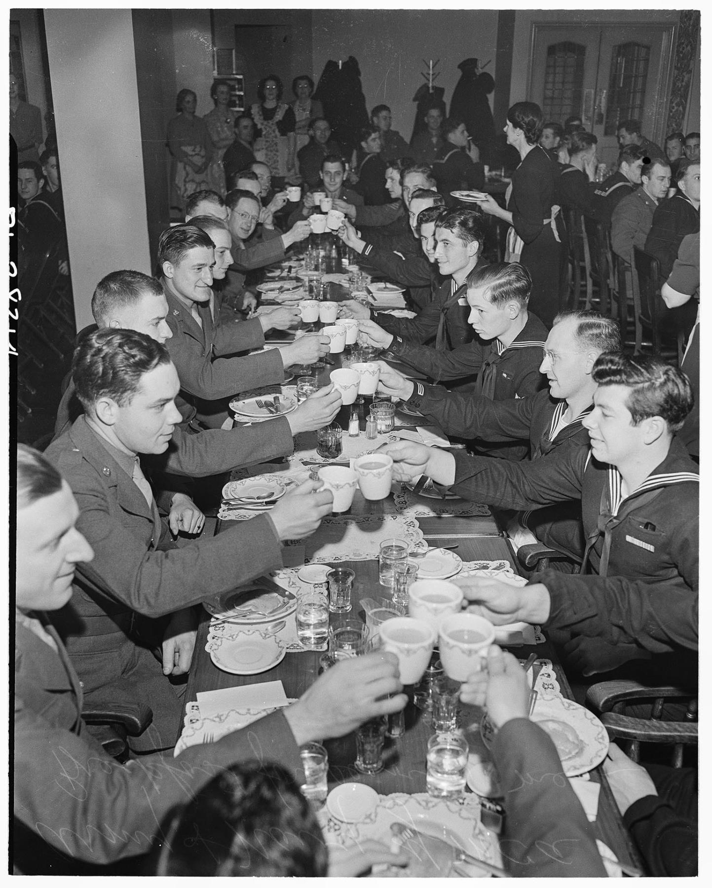 Image of Servicemen eating at YMCA, Seattle, April 1943